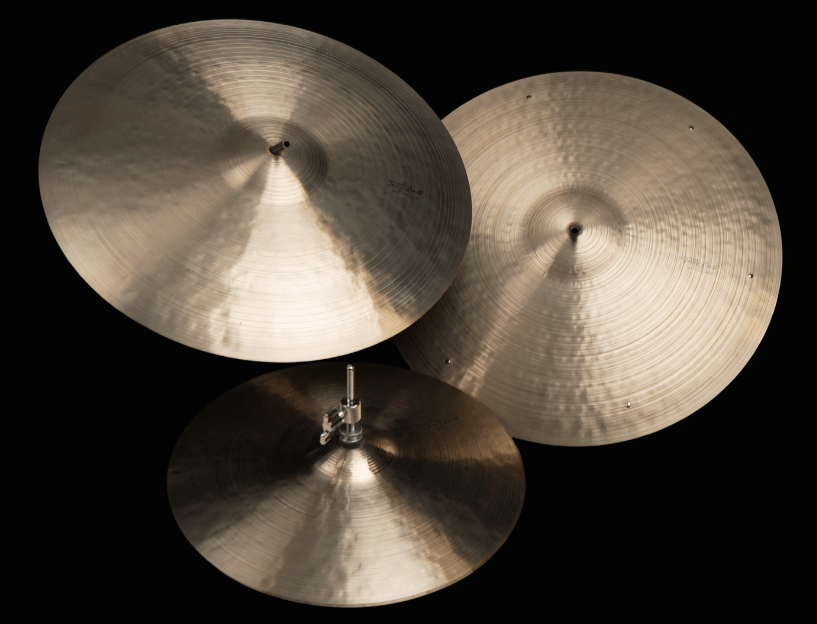 Multiple Cymbals and a Hi Hat on a black background