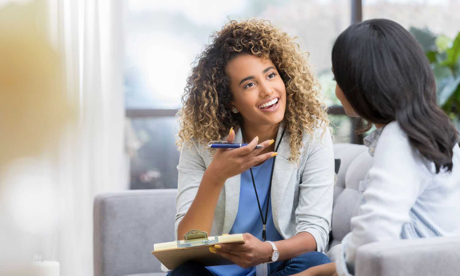 A Level-Up Life coach working with a woman with ADHD to help her build sustainable habits and work on strategies for emotional regulation