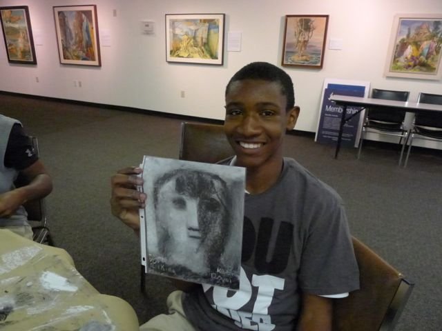 A student presents his drawing of Dora Rivkina.jpg