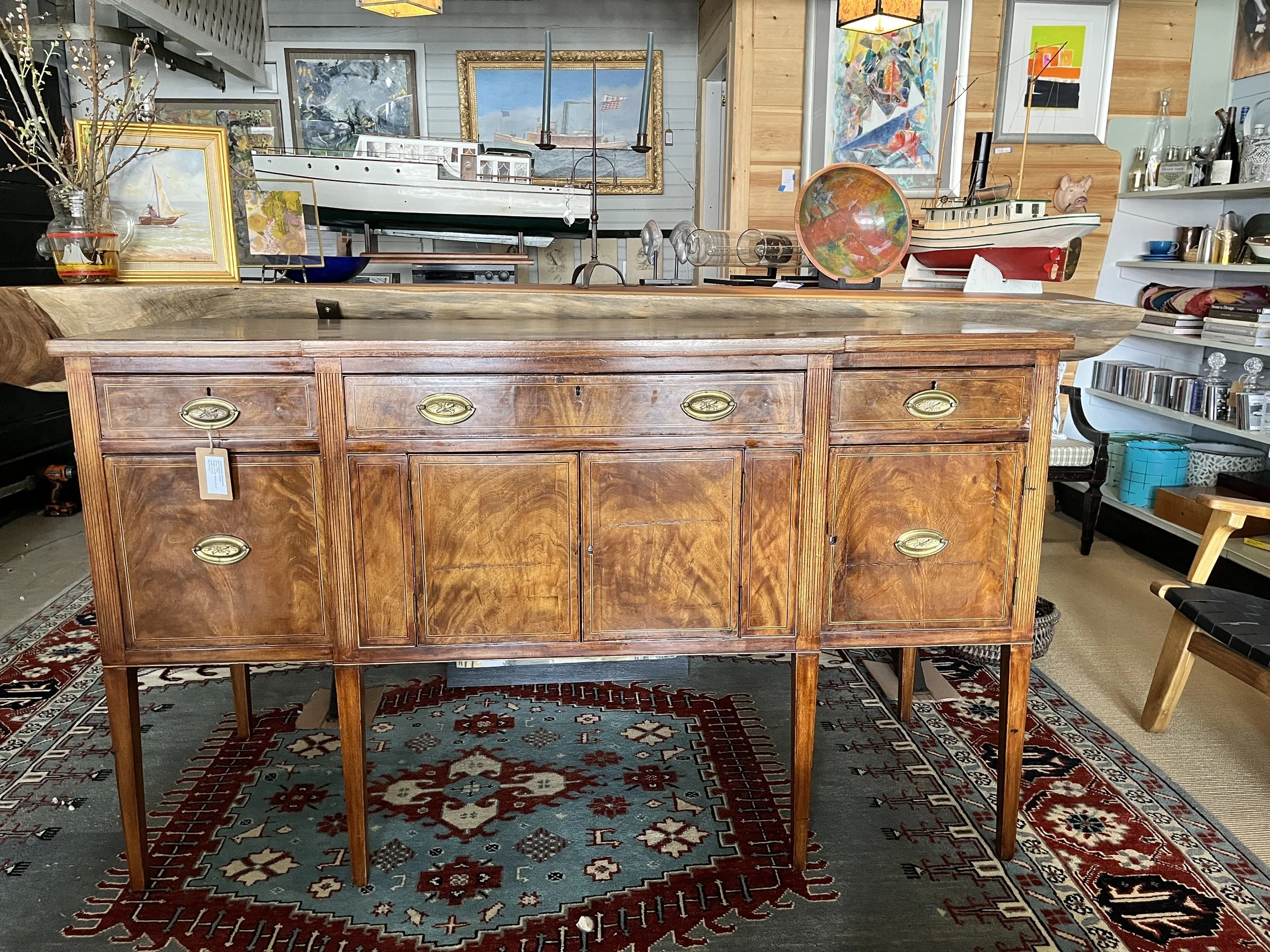  Hepplewhite Style Serpentine Front Sideboard Early 20th Century Height 38" Width 66" Depth 18"	$2,950.00 