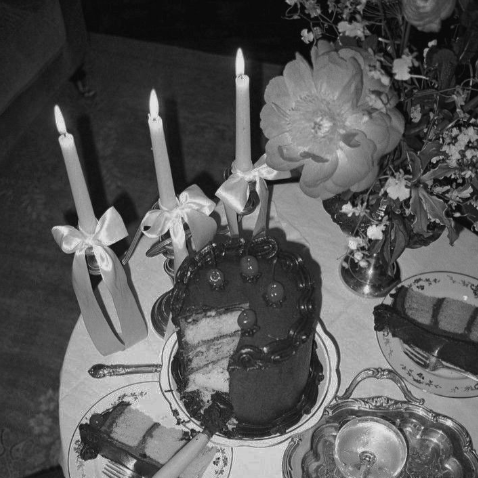 Geometric drawing of an outline square with sections divided by vertical, horizontal, and diagonal lines.