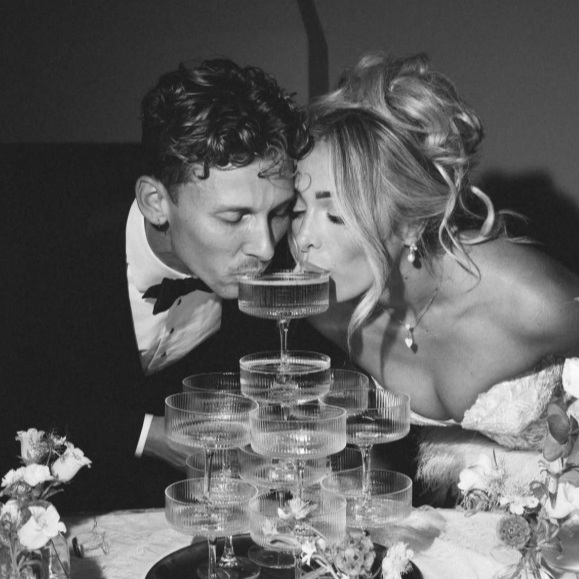 Geometric drawing of an outline square with sections divided by vertical, horizontal, and half circle lines.