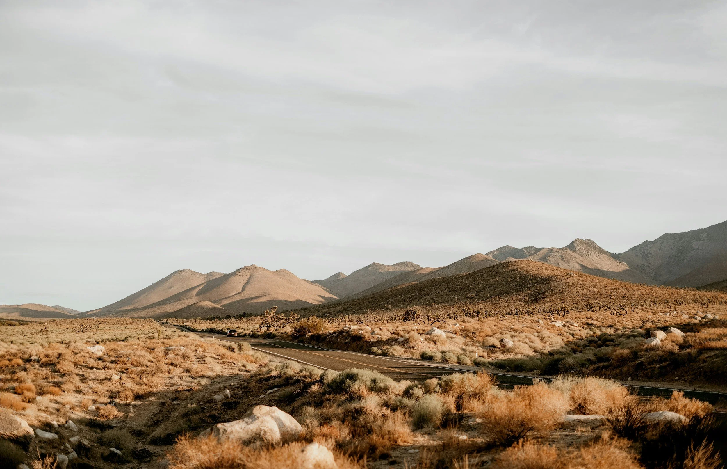 A road runs through a rocky landscape