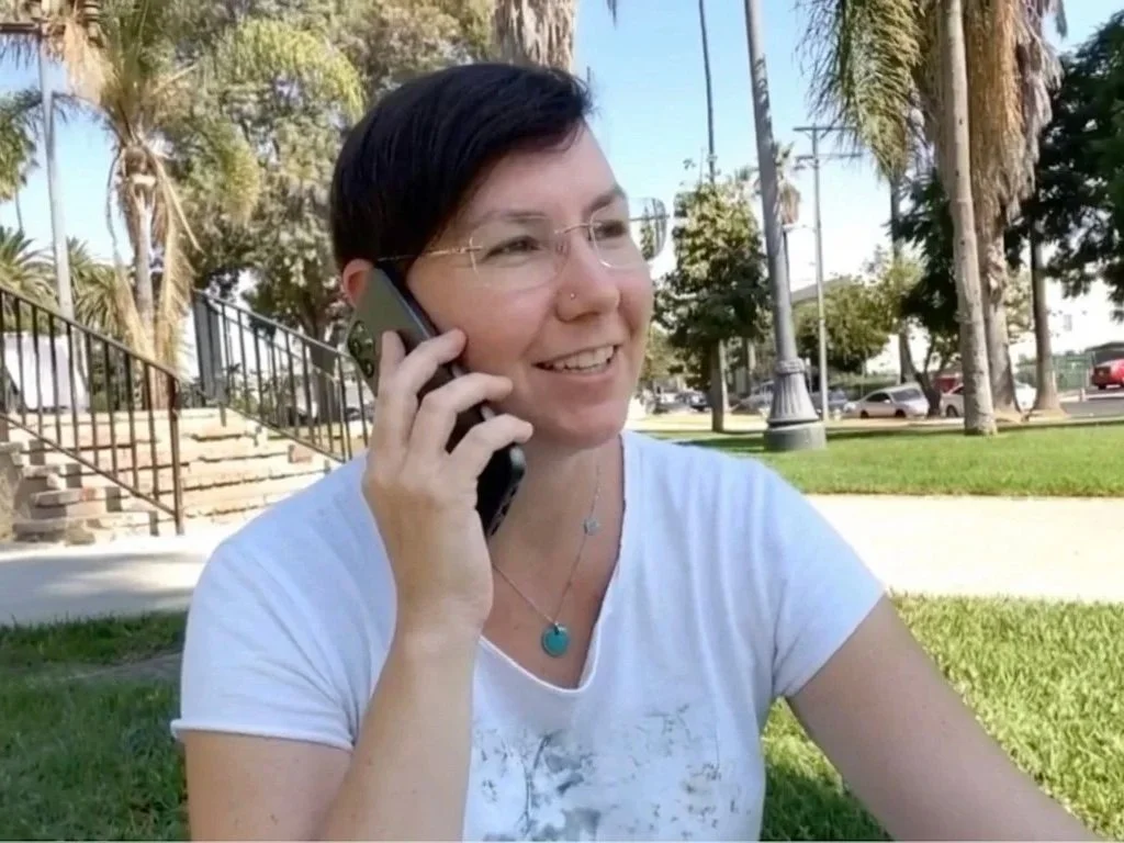 Karen from Ellay Pizza answering a phone call for a high-end Italian catering event in Los Angeles