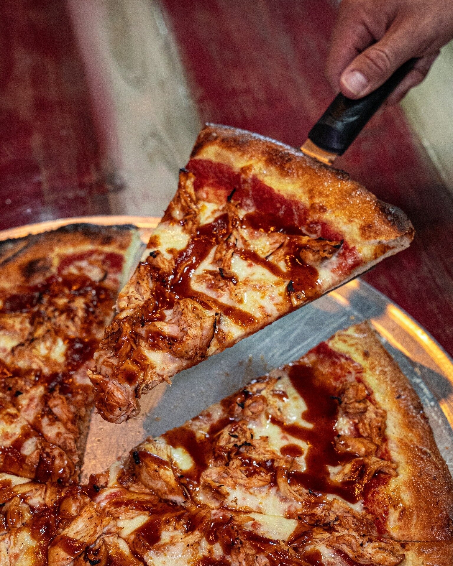 Experience a flavor sensation that ignites your taste buds with our BBQ Chicken Pizza! 😎 🍕