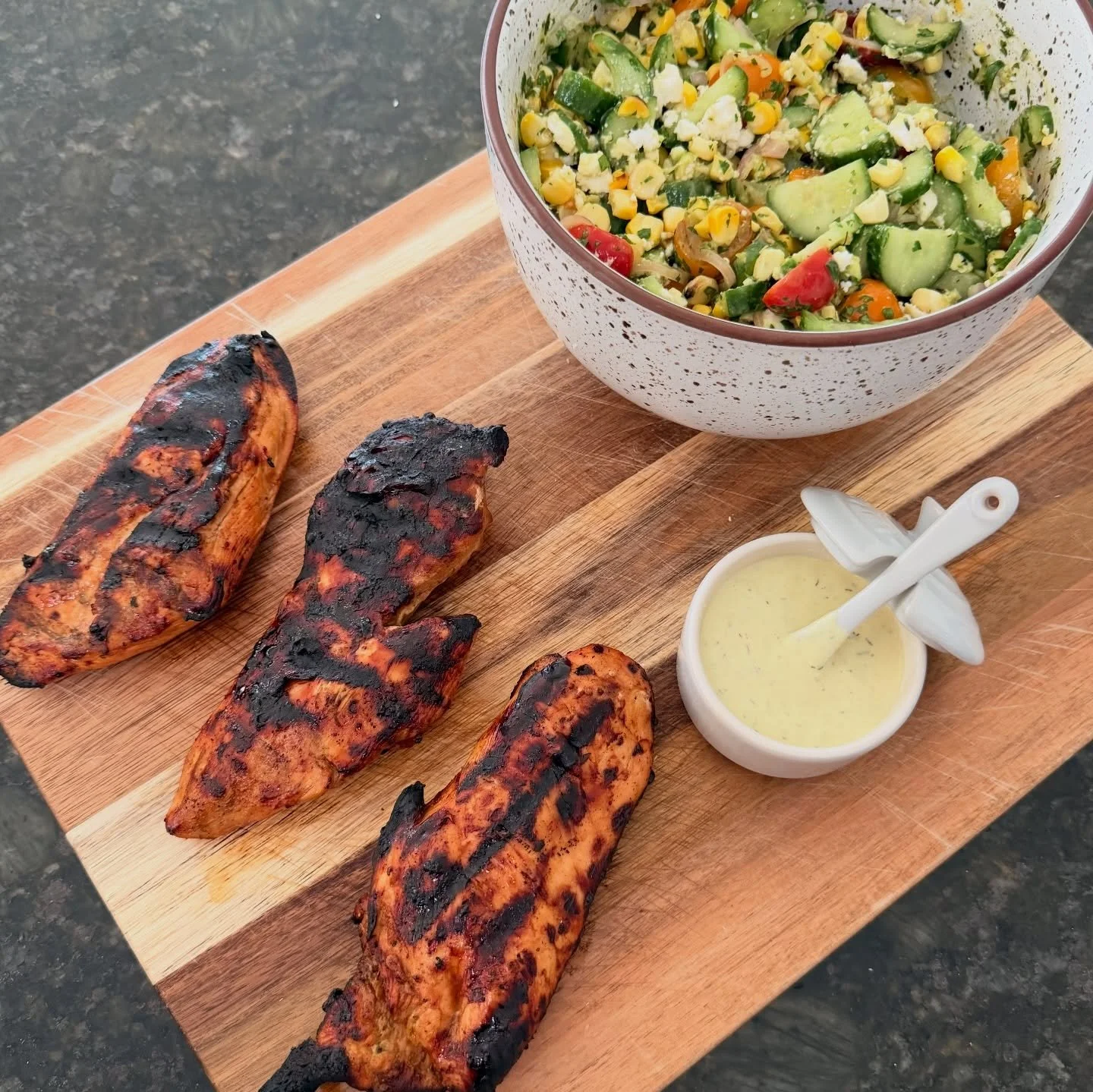 first outdoor grill of the season ❤️ grilled chicken &amp; corn + cucumber, tomato, avocado salad &amp; avocado lime ranch on the side

HONEY BALSAMIC CHICKEN
&bull; place 5 chicken breasts in baking dish
&bull; drizzle with balsamic vinegar, tamari,