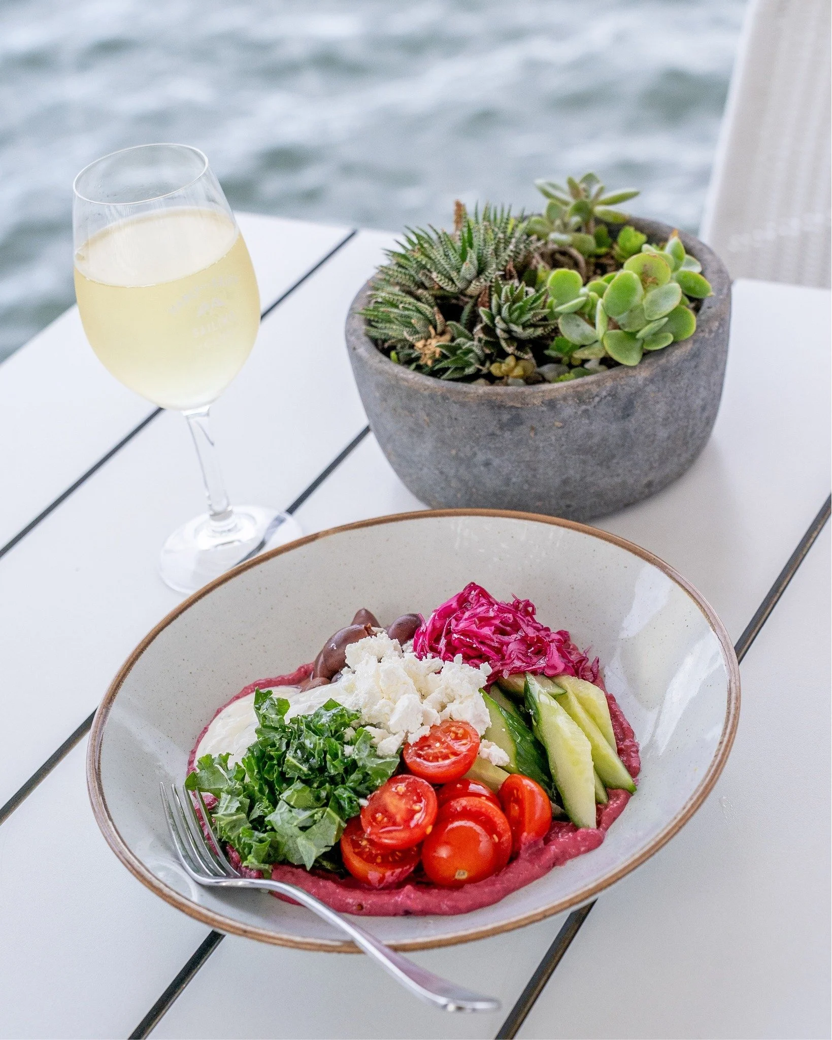 Bright flavours and fresh colours &ndash; our Mediterranean Bowl is a taste of the coast. Beetroot hummus, quinoa, kale, cucumber, feta, olives, yoghurt, pickled red cabbage.