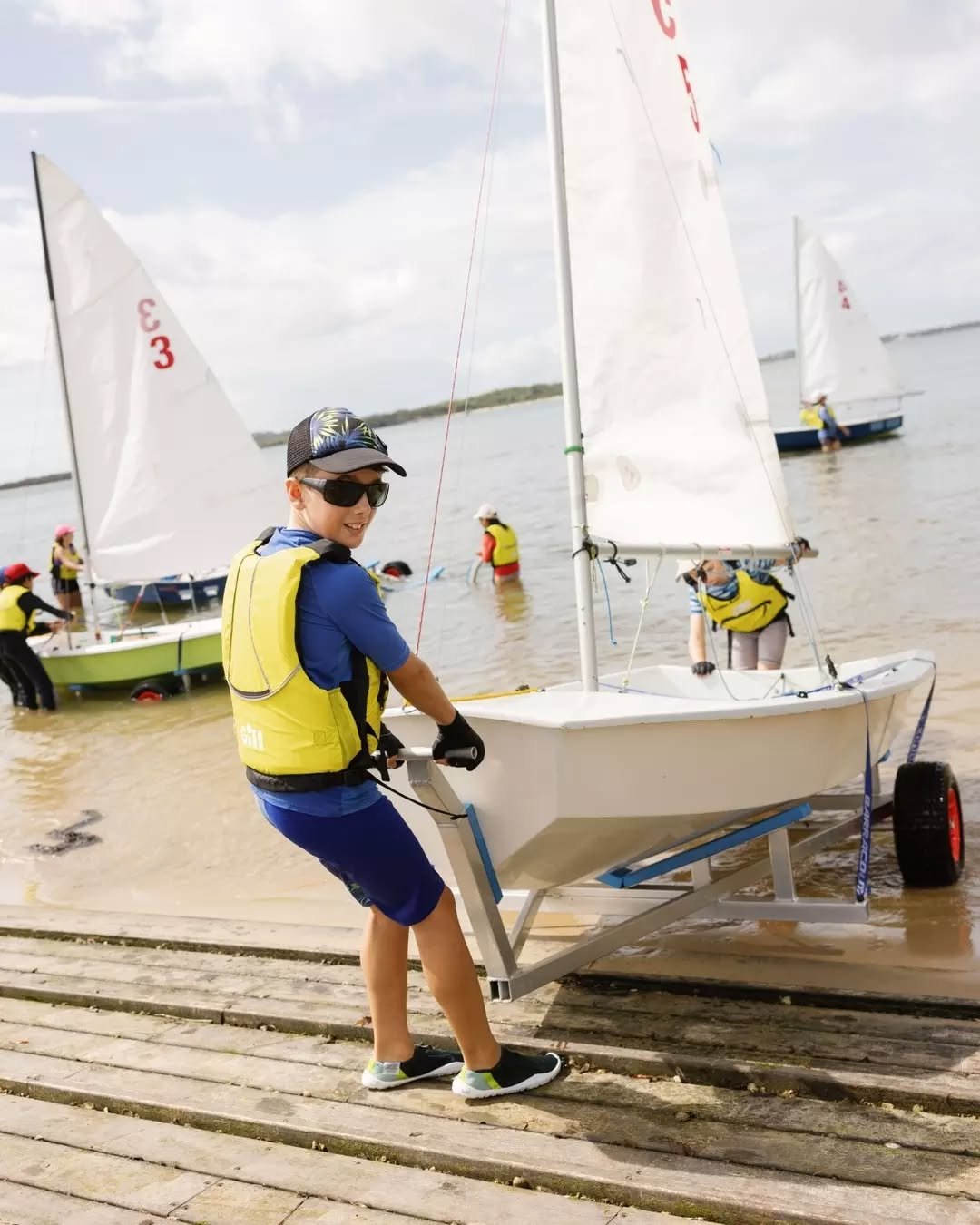 Next stop: the water.

Rigged, ready, and full of energy, our young sailors know how to launch into a great day on the bay.