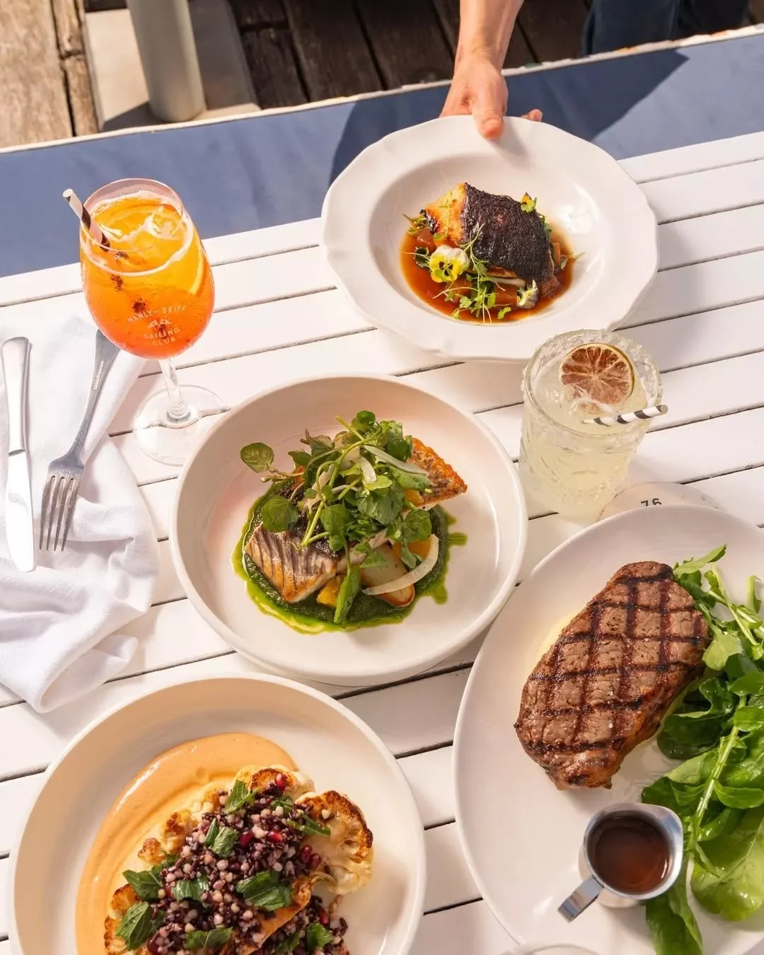 Nothing beats good food, waterfront views, and an @aperolspritzau in hand. This is how we do weekends at St George.

From expertly seared fish to juicy steak, this is dining St George style. Come hungry, leave happy.