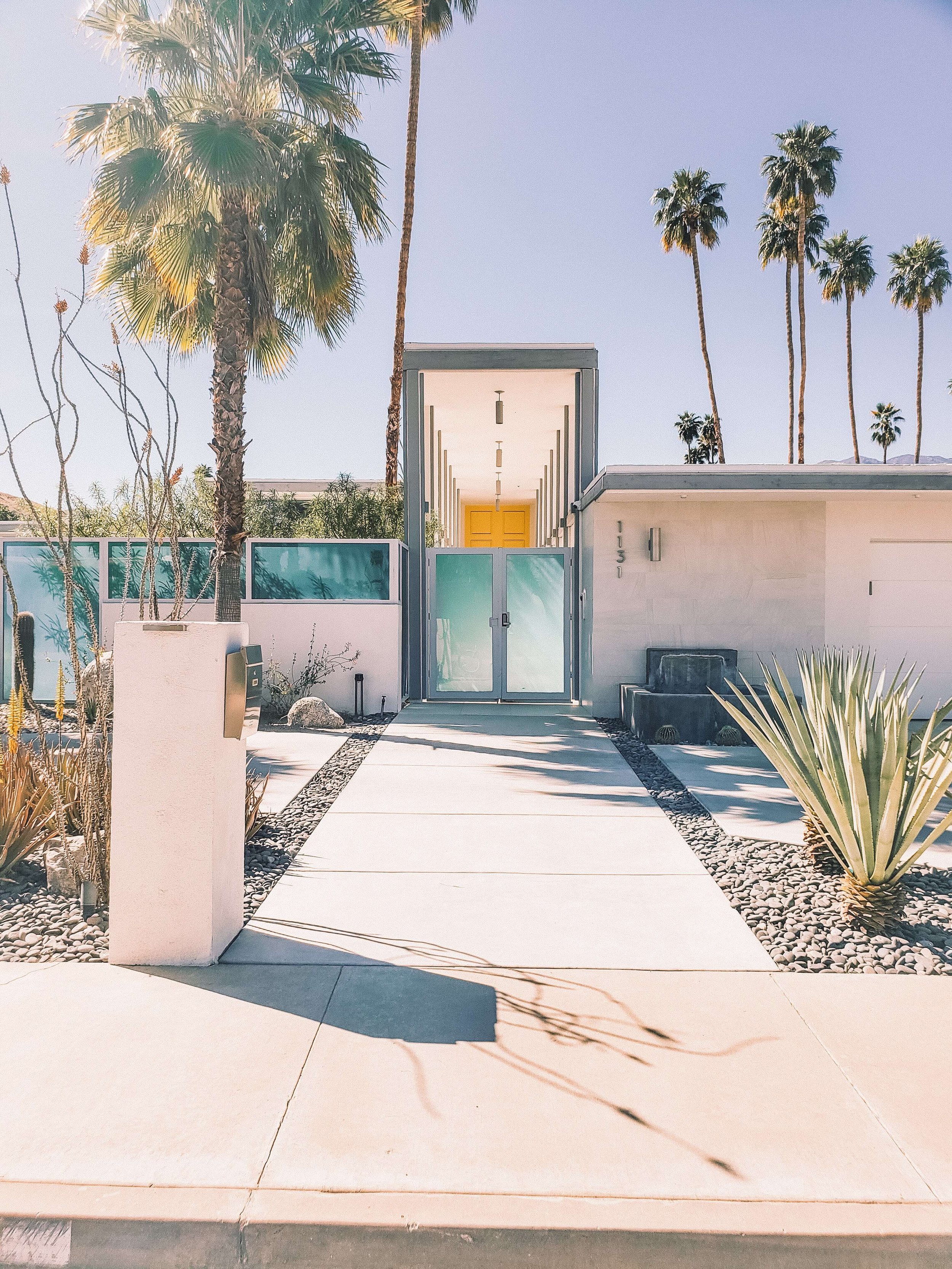Modern house with yellow door in Palm Springs