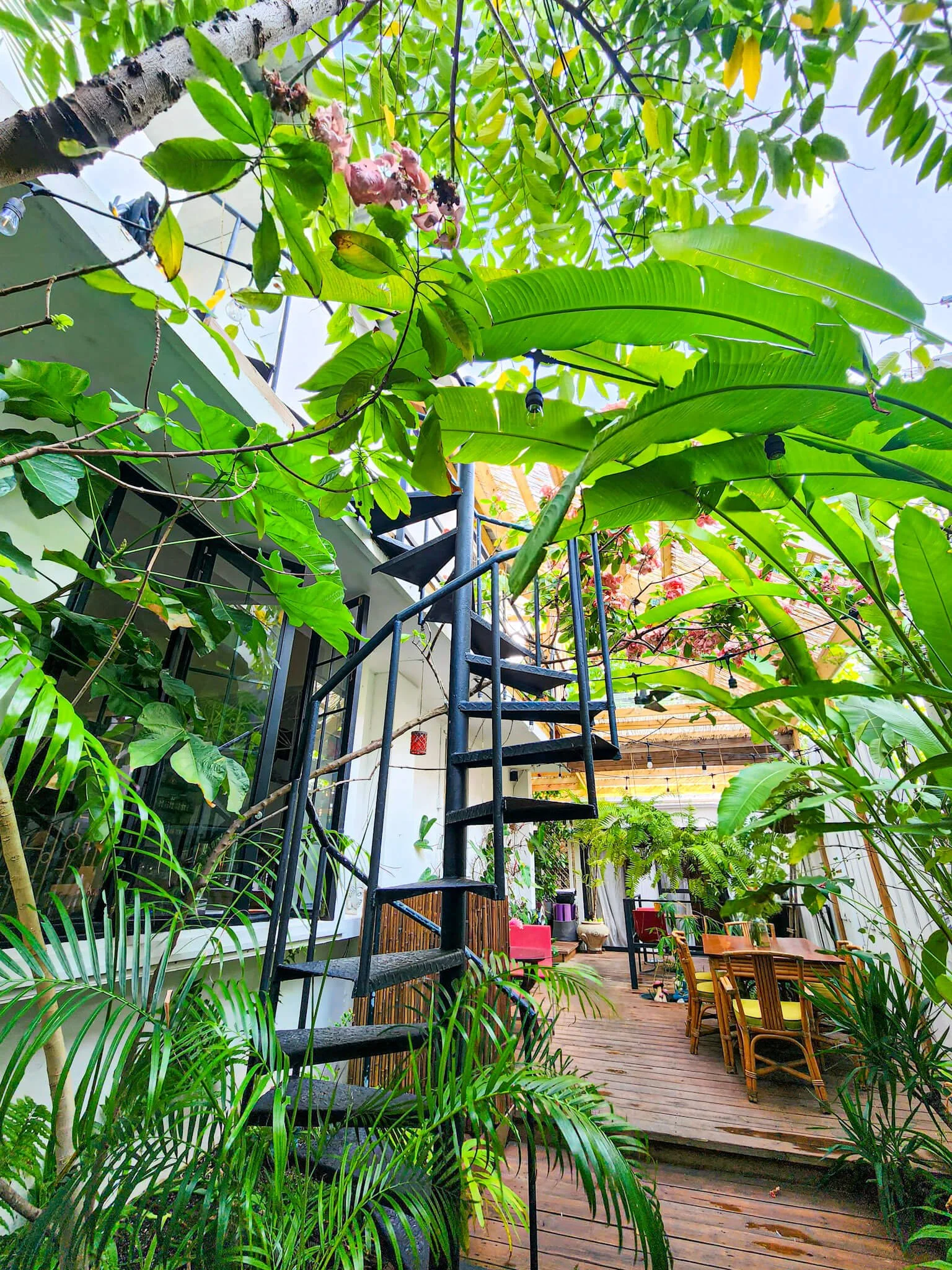 Spiral staircase at La Botanica Hotel.jpg