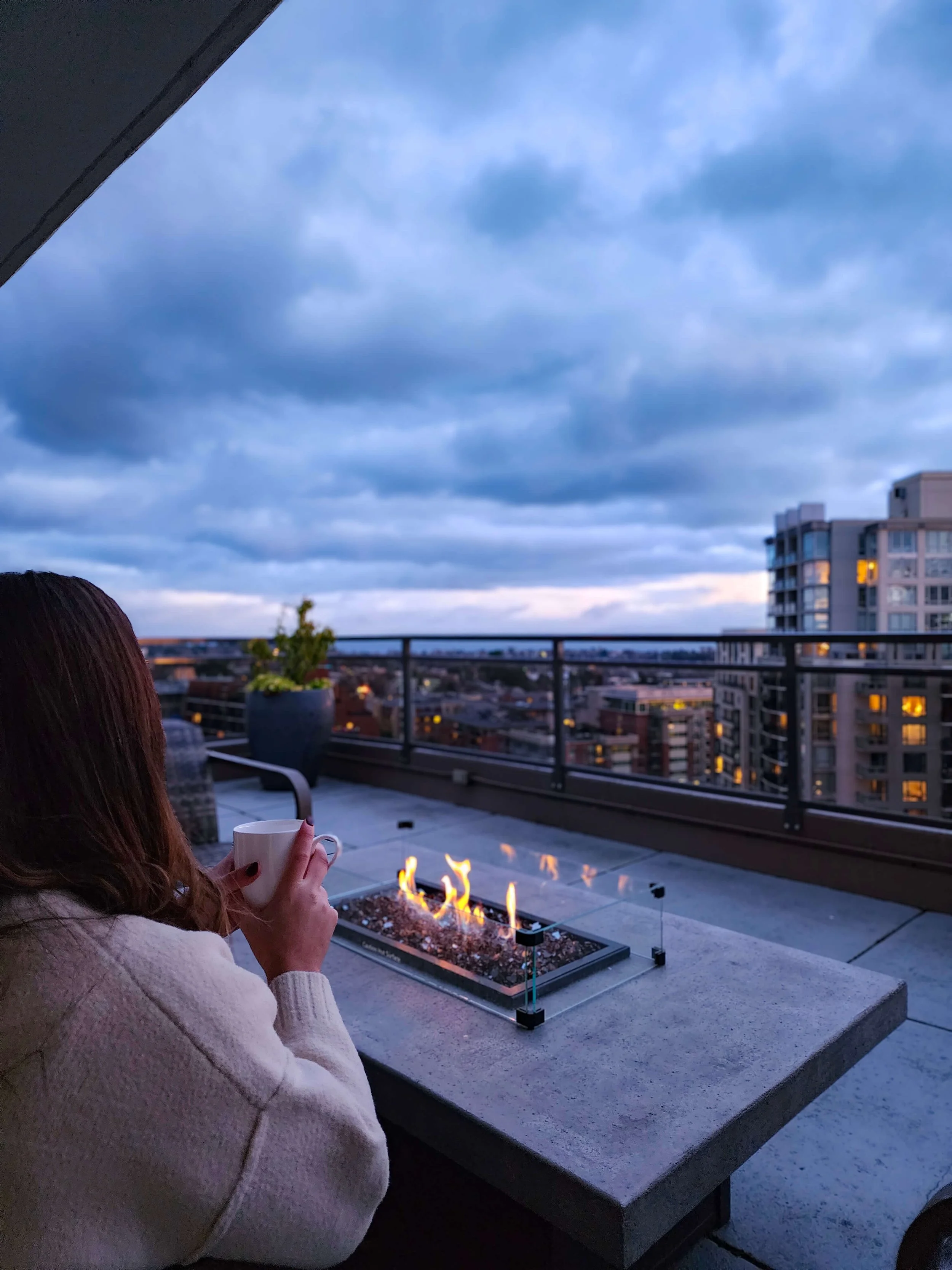 Fire pit view on penthouse balcony at Chateau Victoria.jpg