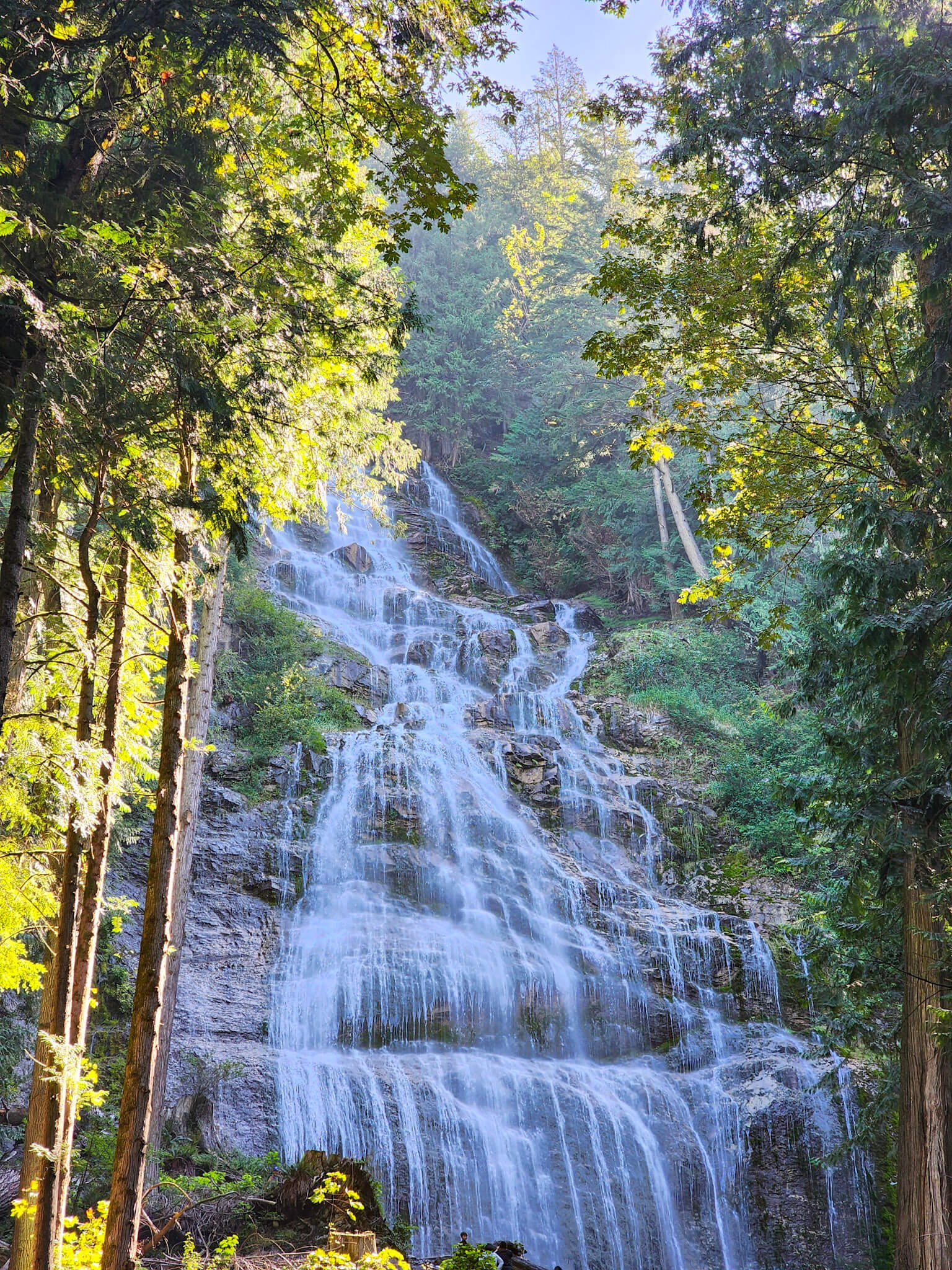 View of Bridal Veil Falls waterfall in British Columbia on a sunny day.