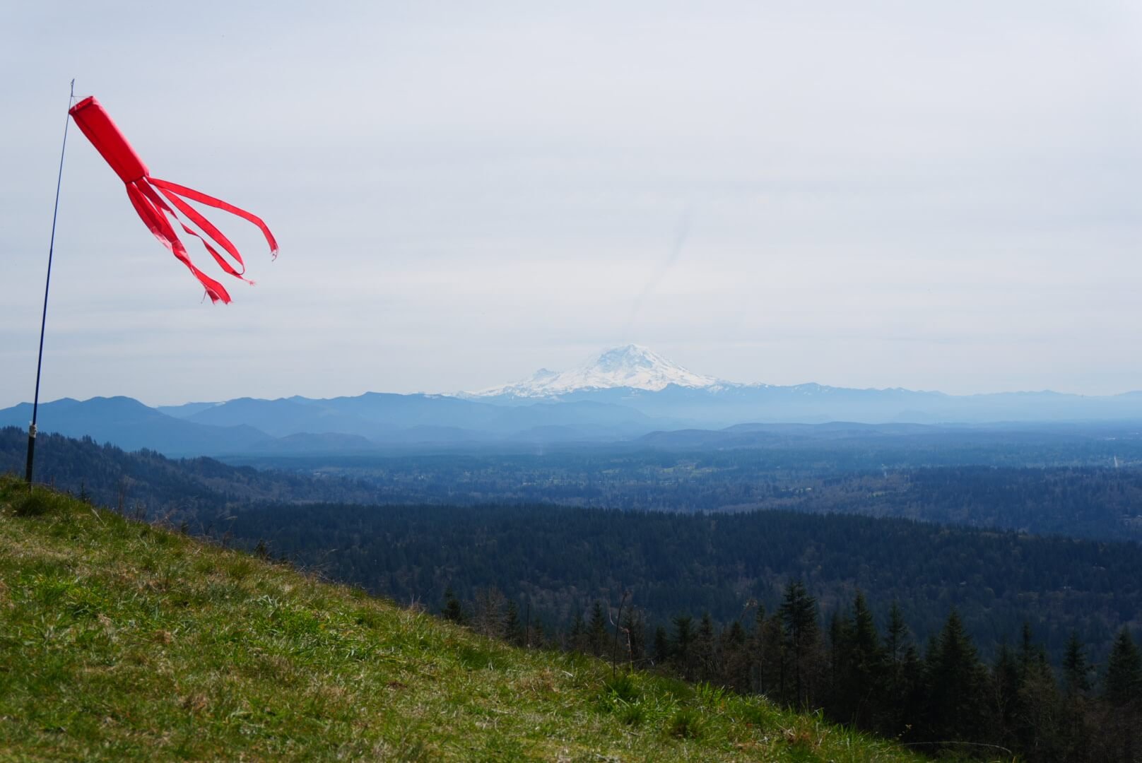 View of Mount Rainier for the viewpoint area on Poo Poo Point trail in Washington