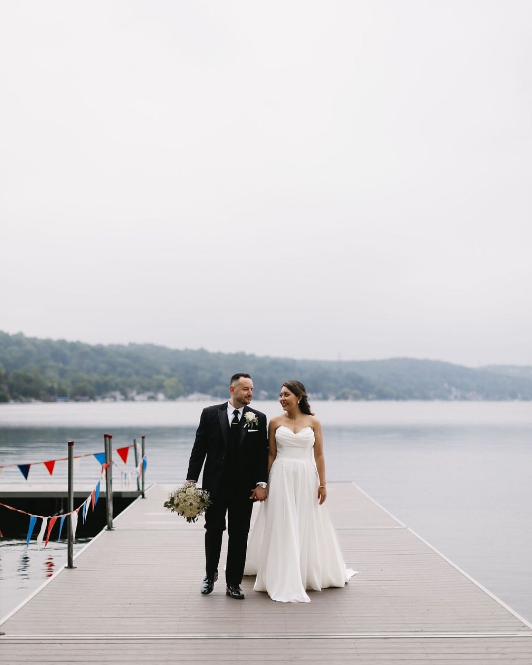 A rainy, romantic day on the lake with Rosmery + Rob. They embraced the weather, got a little wet, and made the kind of memories you can&rsquo;t plan for.⁠
.⁠
Vendors -⁠
Venue: @lakemohawkcountryclub⁠
Hair: Connie Esparza - @truepassionartistry ⁠
Mak