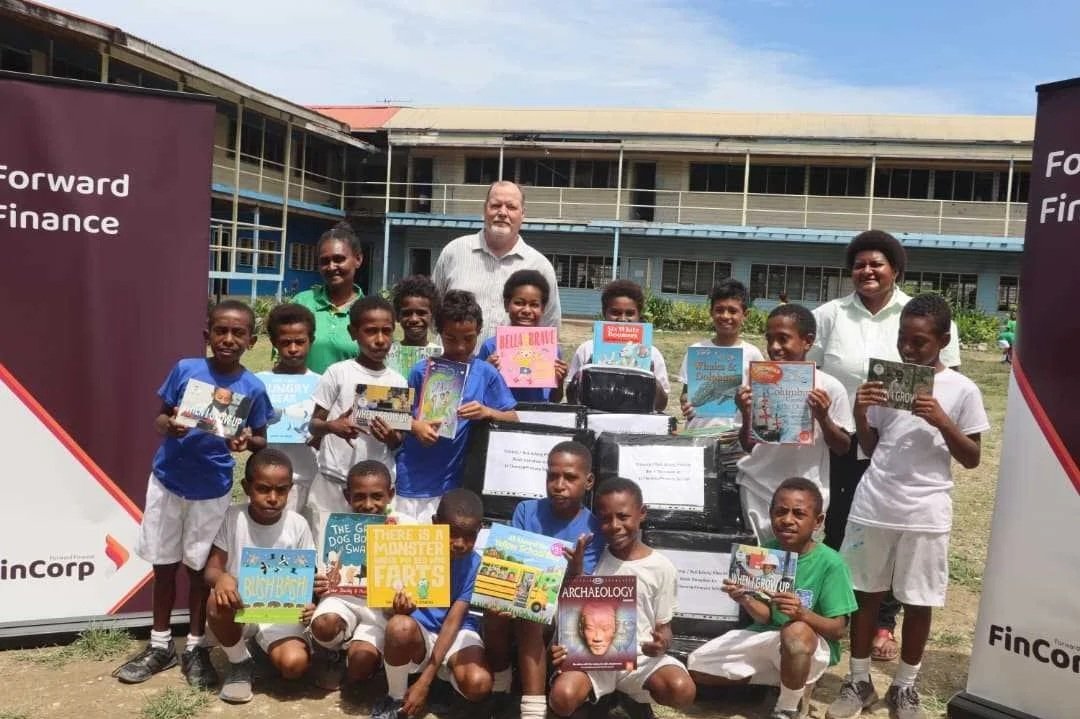 Celebrating World Book Day: St Therese Primary School receives much-needed library books for their students.
