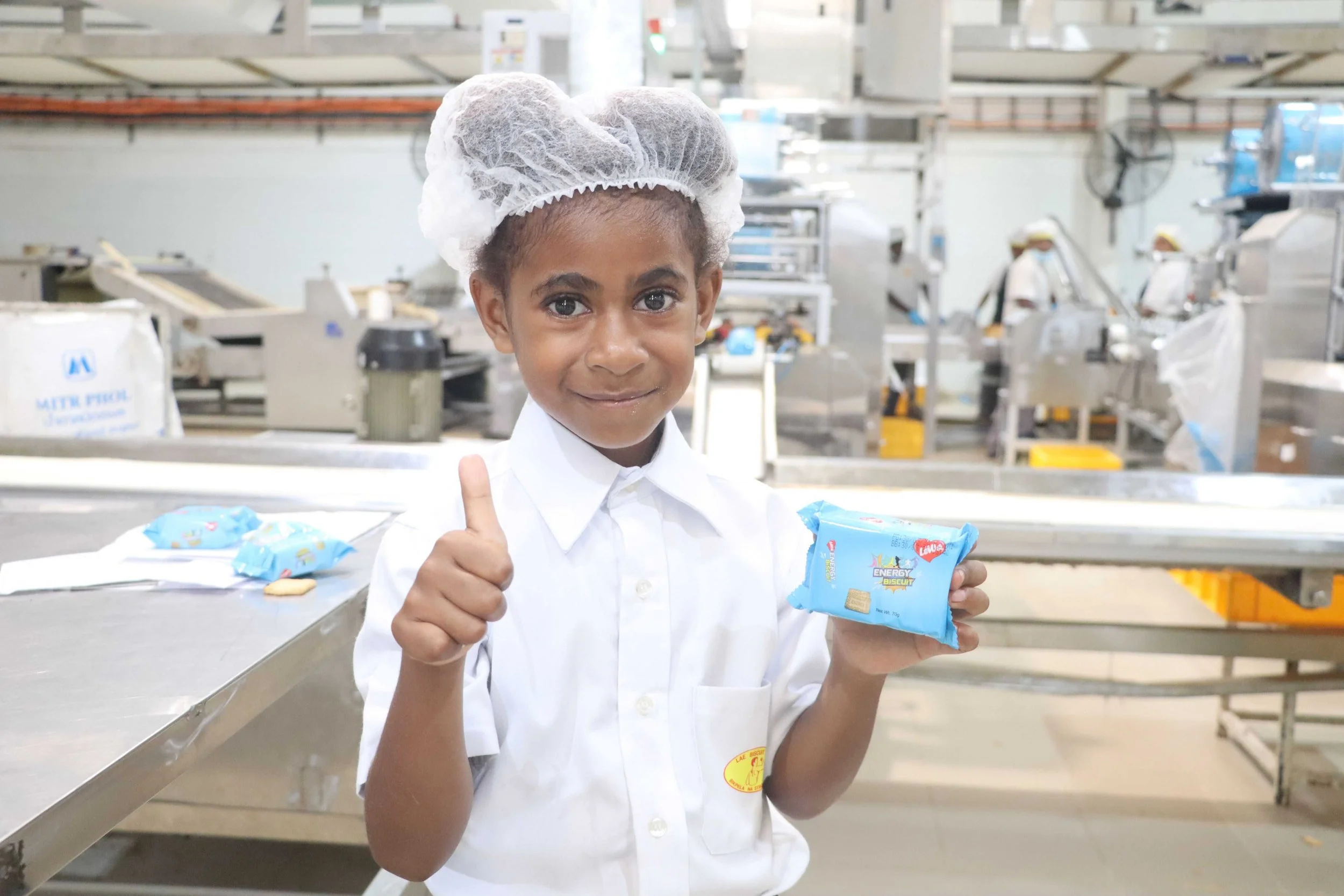 Inspiring Big Dreams: Buk bilong Pikinini and Lae Biscuit Company Collaborate on New “When I Grow Up” Reader