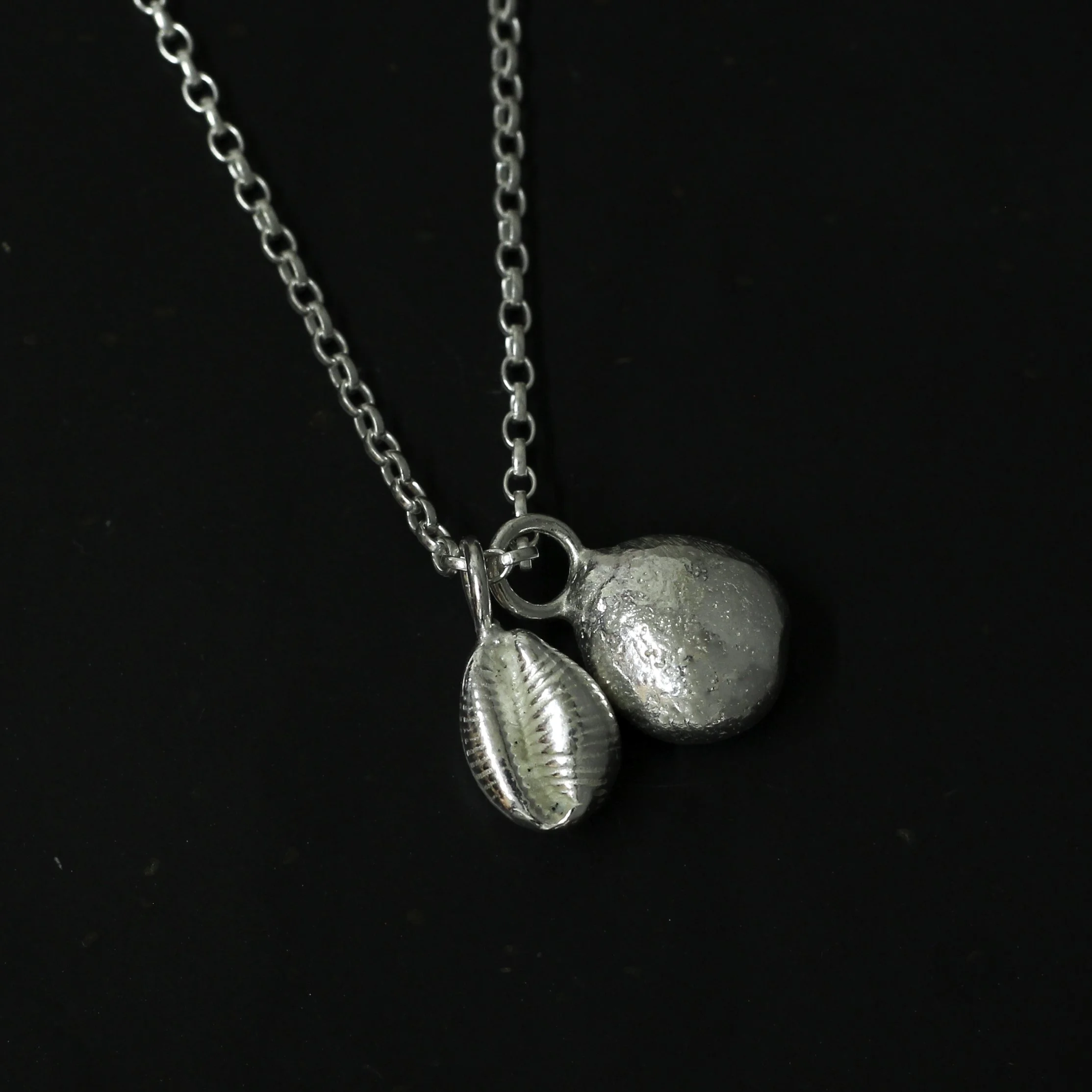 300 sq- pebble and cowrie.jpg