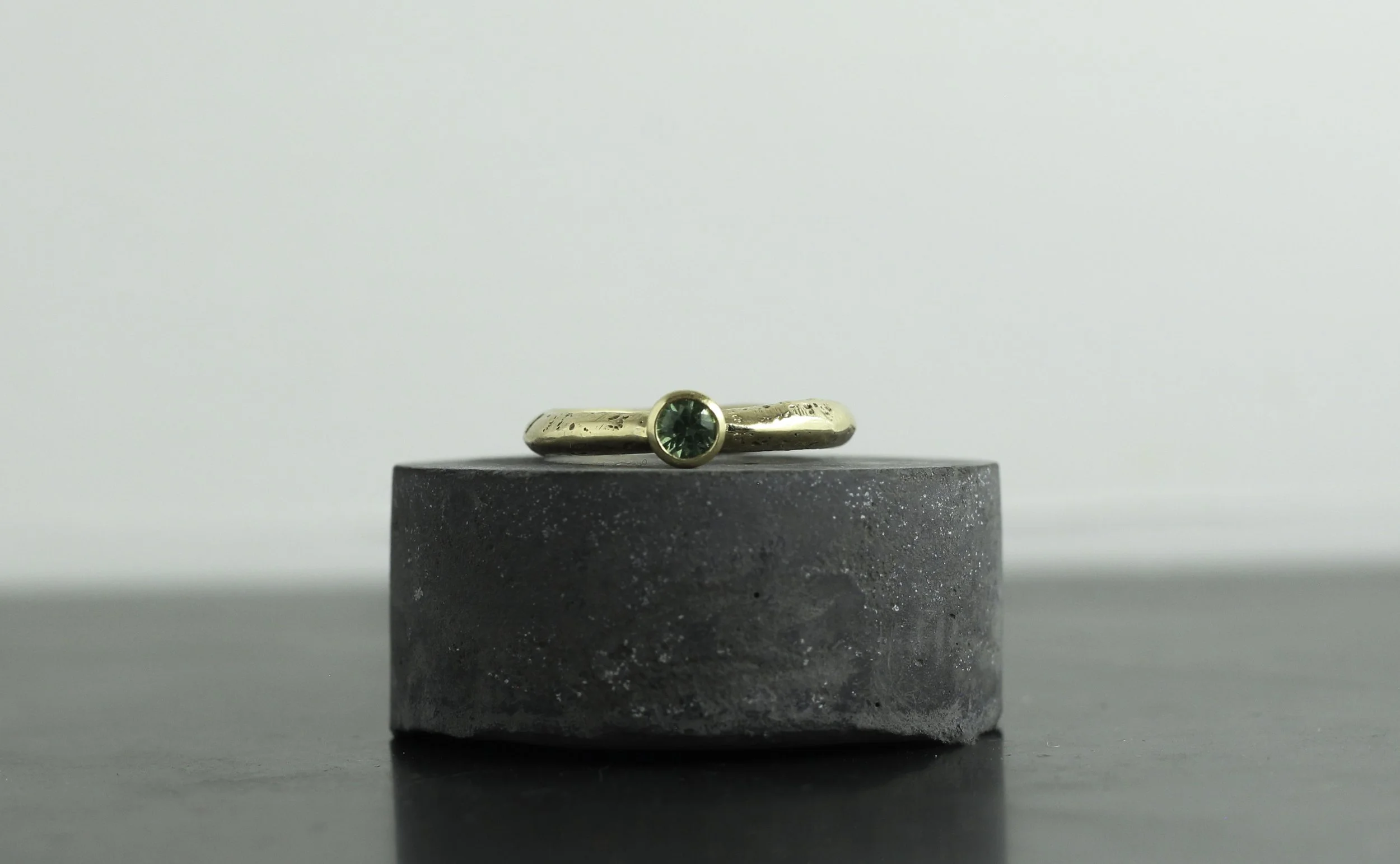 300 gold green saph solitaire .jpg