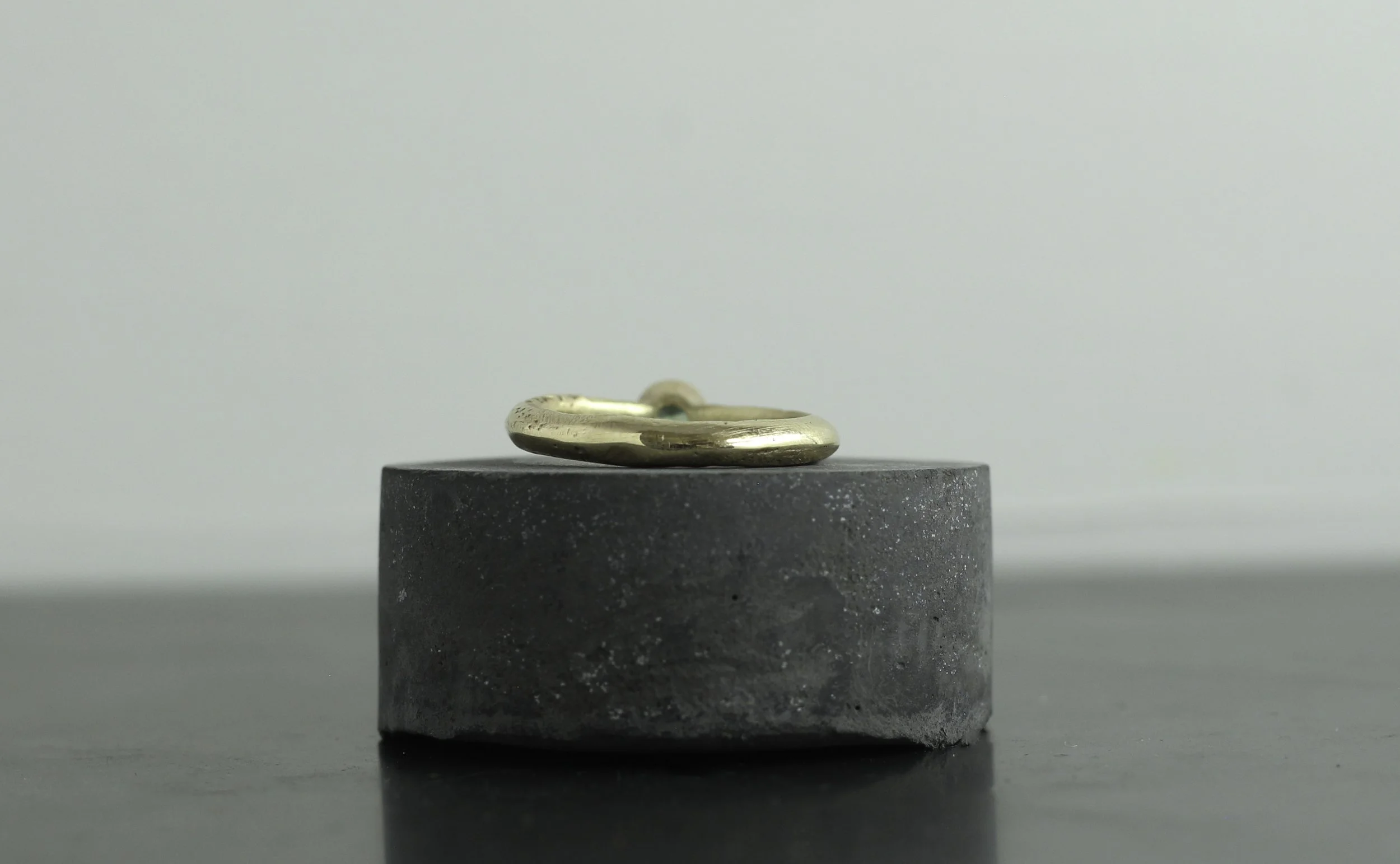 300 gold green saph solitaire.jpg