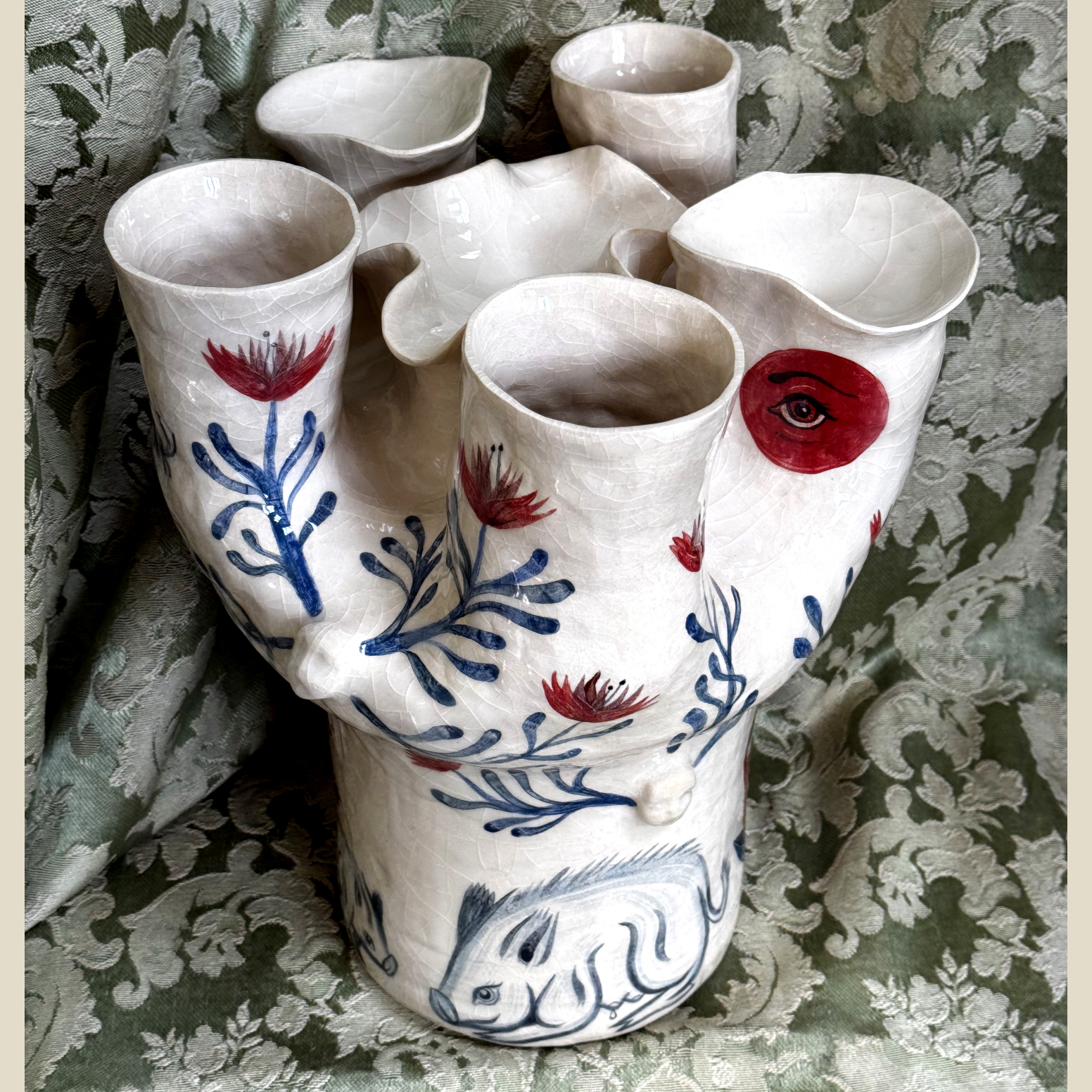 Handpainted ceramics with illustrative patterns that tell stories of cultural and historical places.
