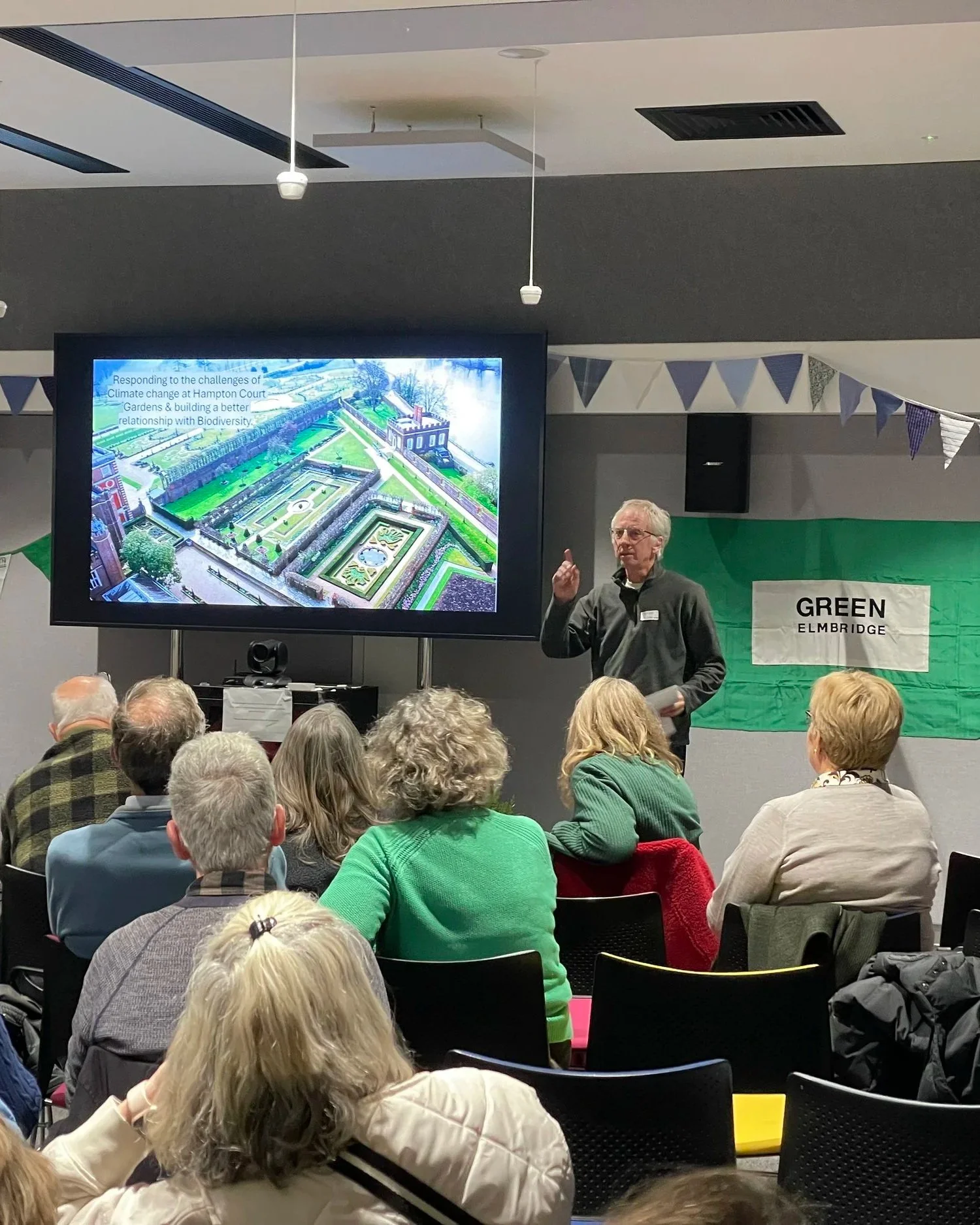 Chris Hyde from Surrey Climate Commission explaining the changes coming with the creation two Surrey unitary authorities.  Chris also introduced the Our Surrey Future Pledge.