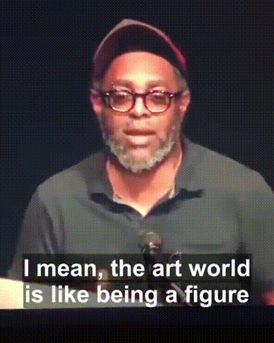 Arthur Jafa explaining that Black people will never reach the pinnacle of success in the arts, as scoring is subjective (using figure skating as an example).