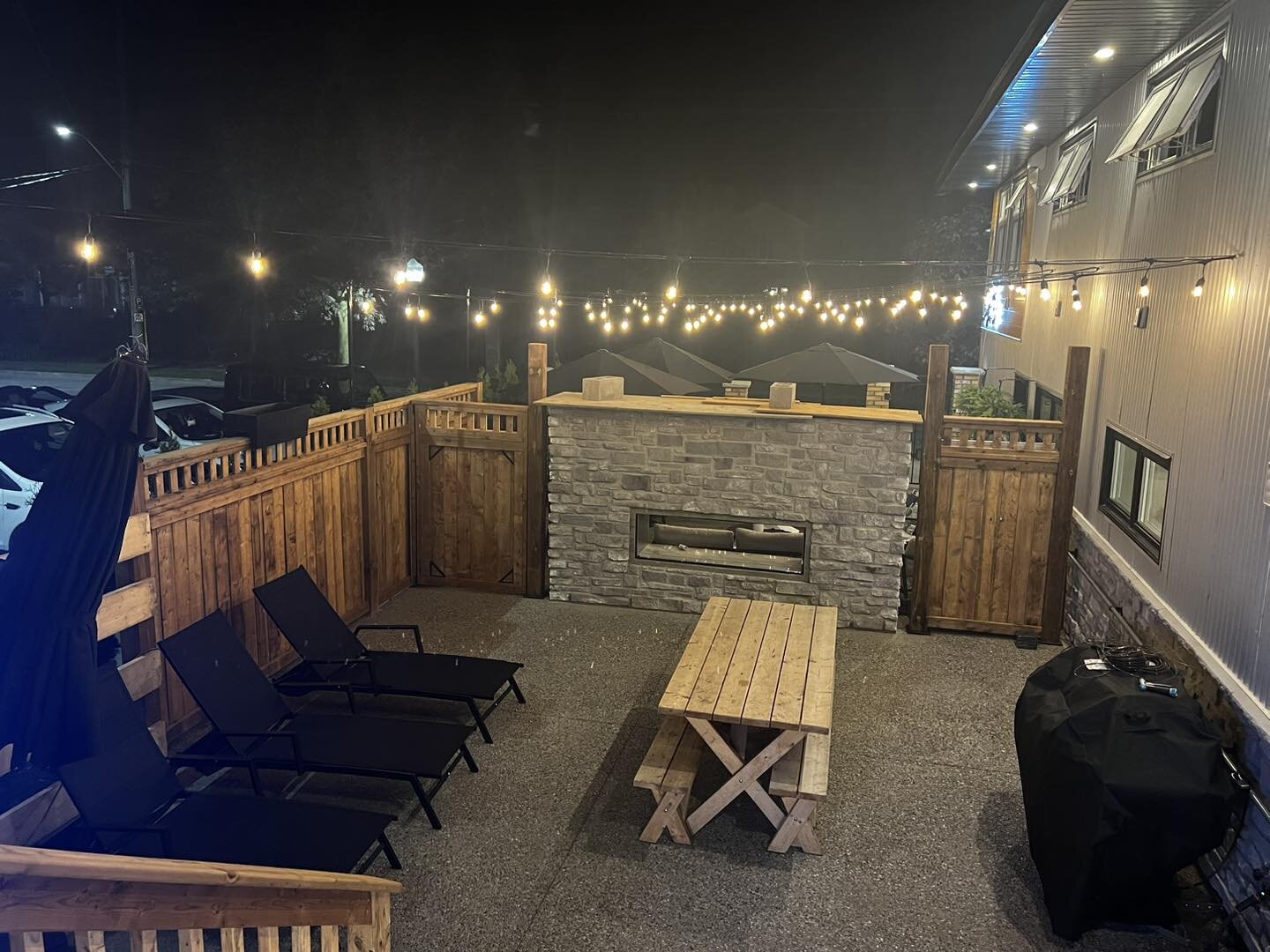 The new patio and amenity space for the hotel is almost complete in time for summer!  Muskoka chairs, Sun loungers, gas bbq, picnic table and a 2 sided gas fireplace will make this an amazing space for our guests to relax!

Visit hotelphilco.com for 