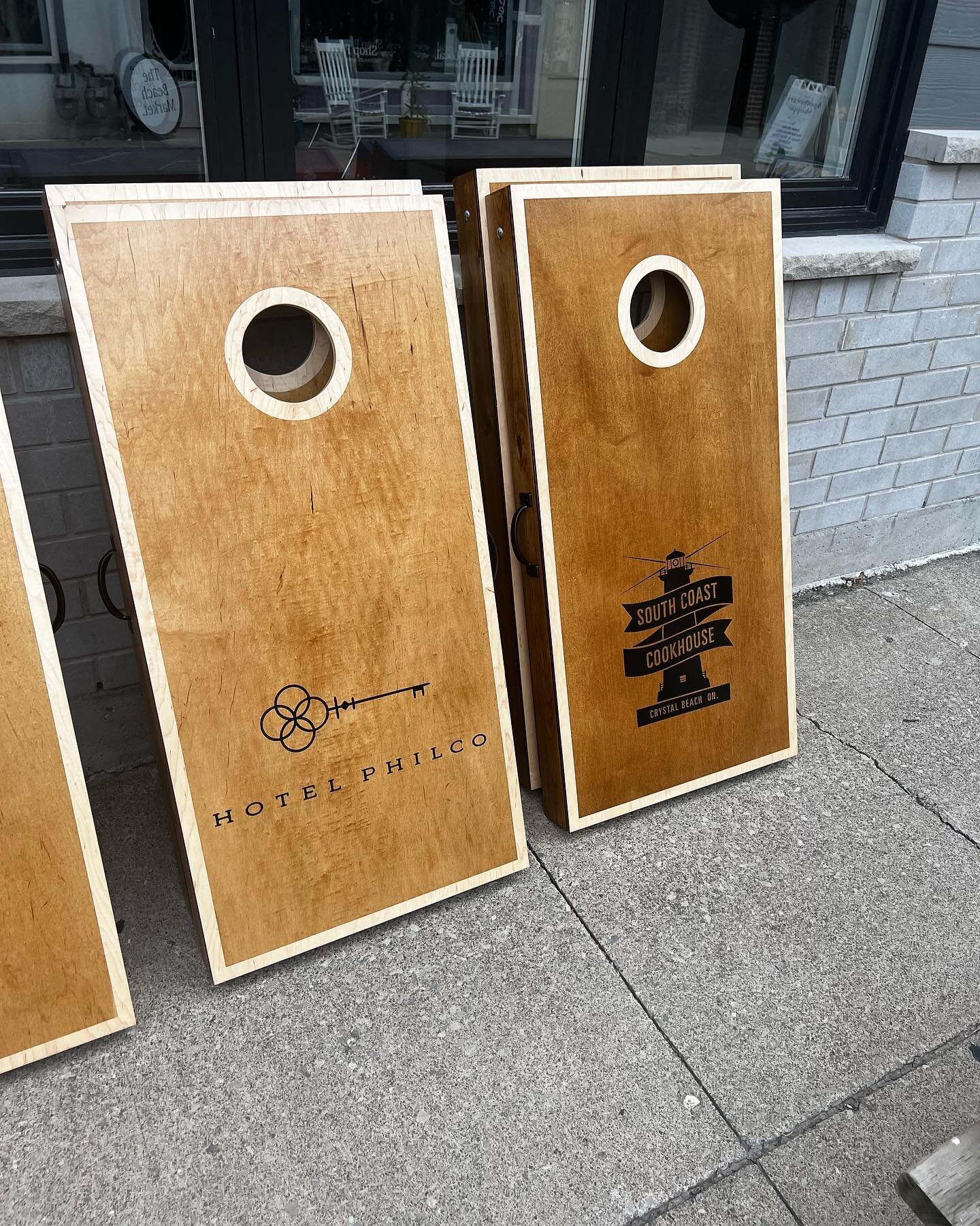 The street the hotel overlooks is closed to cars each weekend, and the community puts out games, and puts on contests and events, live music&hellip;.and is just a fun place to chill and hangout!  We thought we would add some custom cornhole boards to