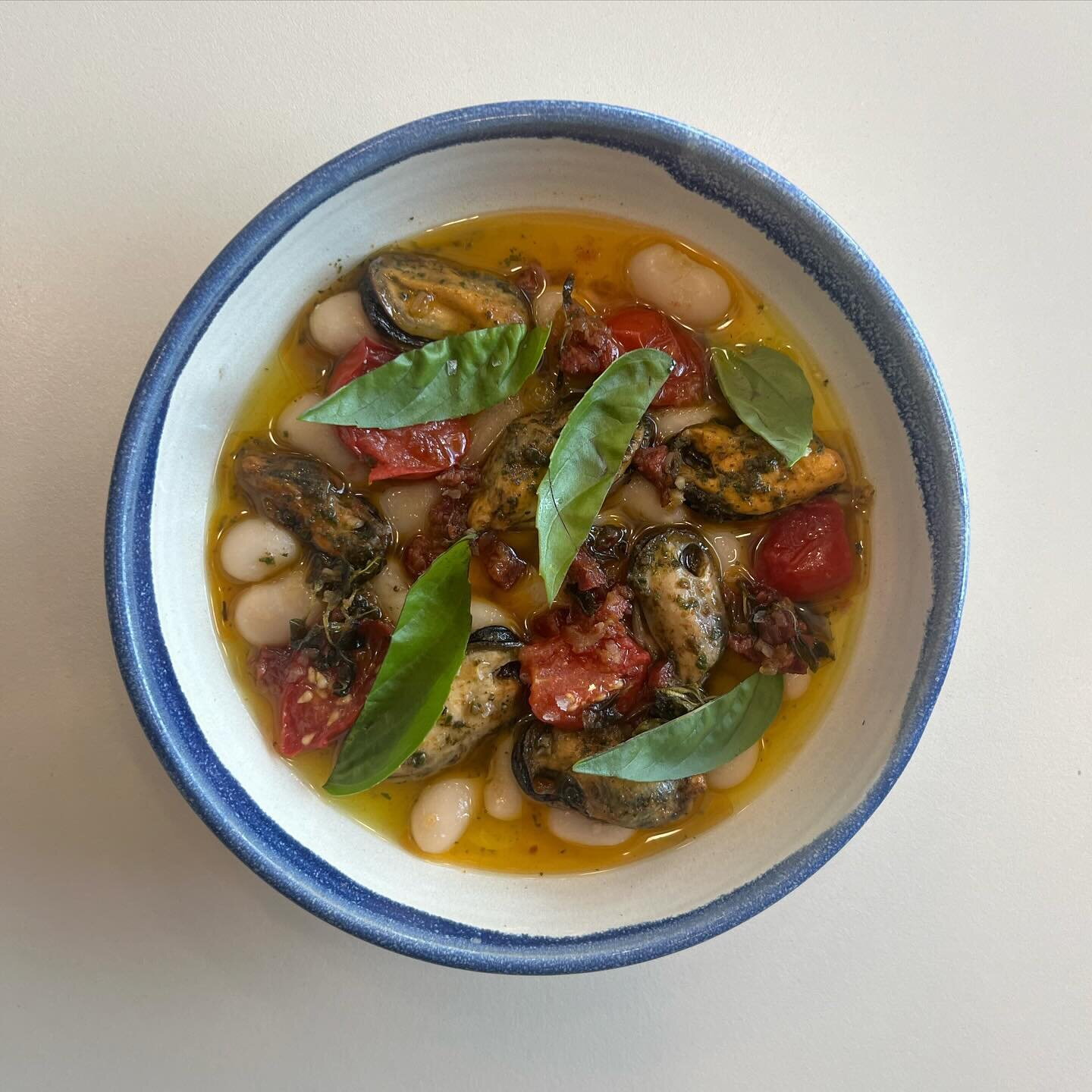 New on the menu this week! Mussels with beans , soutzouki and tomato. Mussels are steamed in dashi and sit in a cold escabeche style broth with plump butter beans. We finish this off with a punchy and crunchy salsa made from soutzouki , a spicy dry s