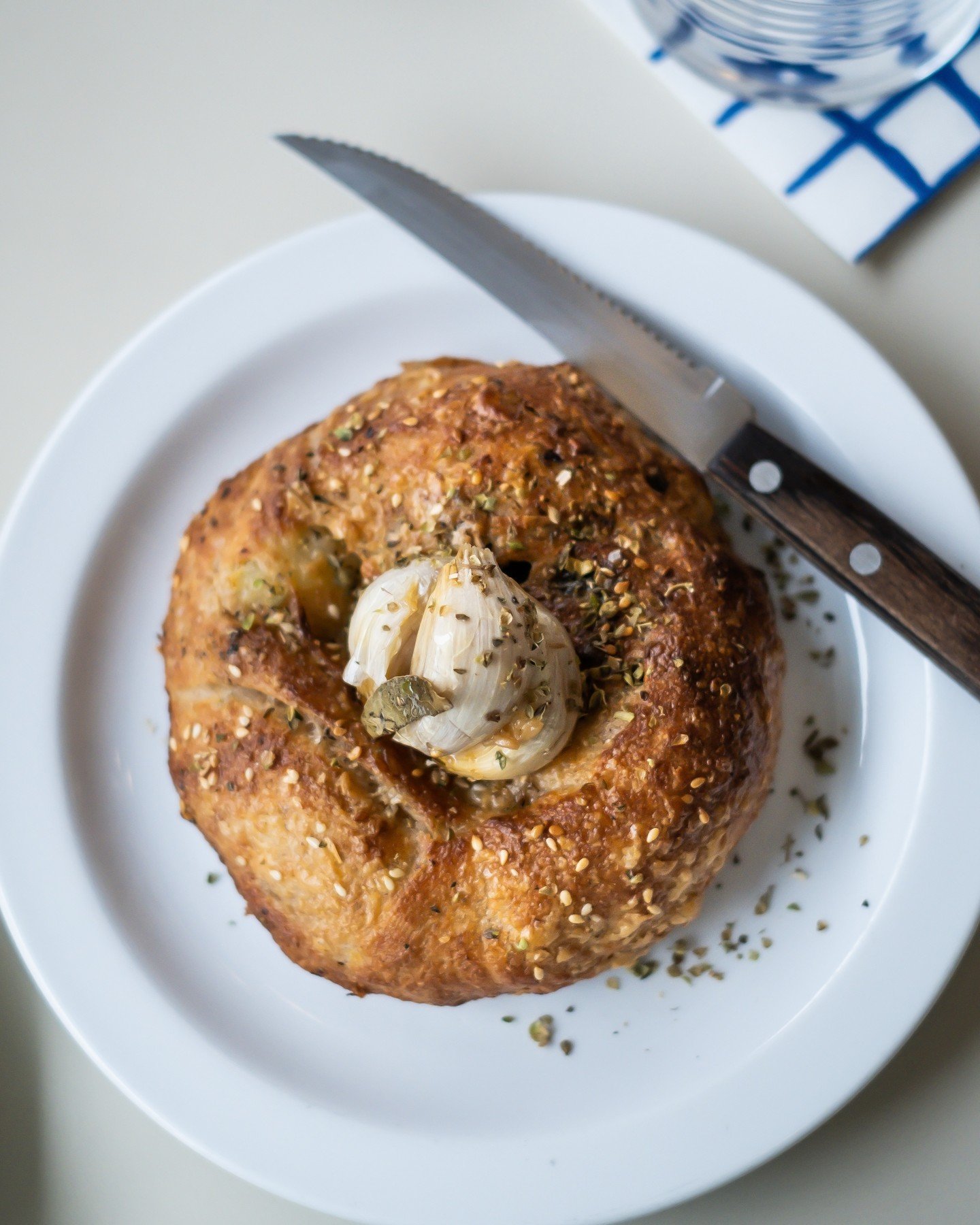 The Eliopita. On our menu from the pop-up days and still going strong. The smell, flavours and process behind this bread will always be special to me. Making dough, slowly pitting olives while sipping on a coffee and snacking on halloumi with my gran