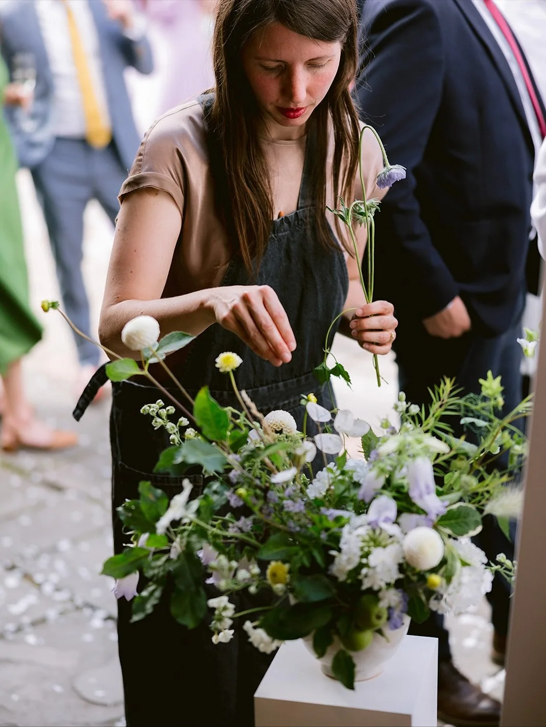 L&amp;G got their professional wedding photos recently and I can&rsquo;t resist sharing a few more. It&rsquo;s so lovely to have some with the happy couple and also to see everything through another lens!

I also got caught in action moving the flowe