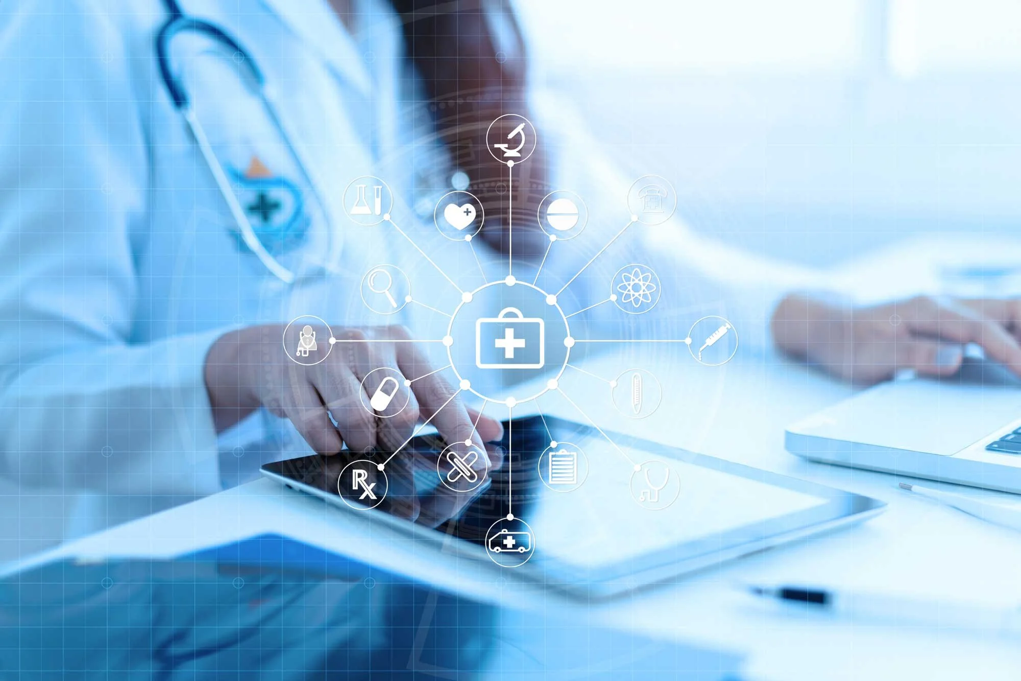 doctor using iPad to examine results