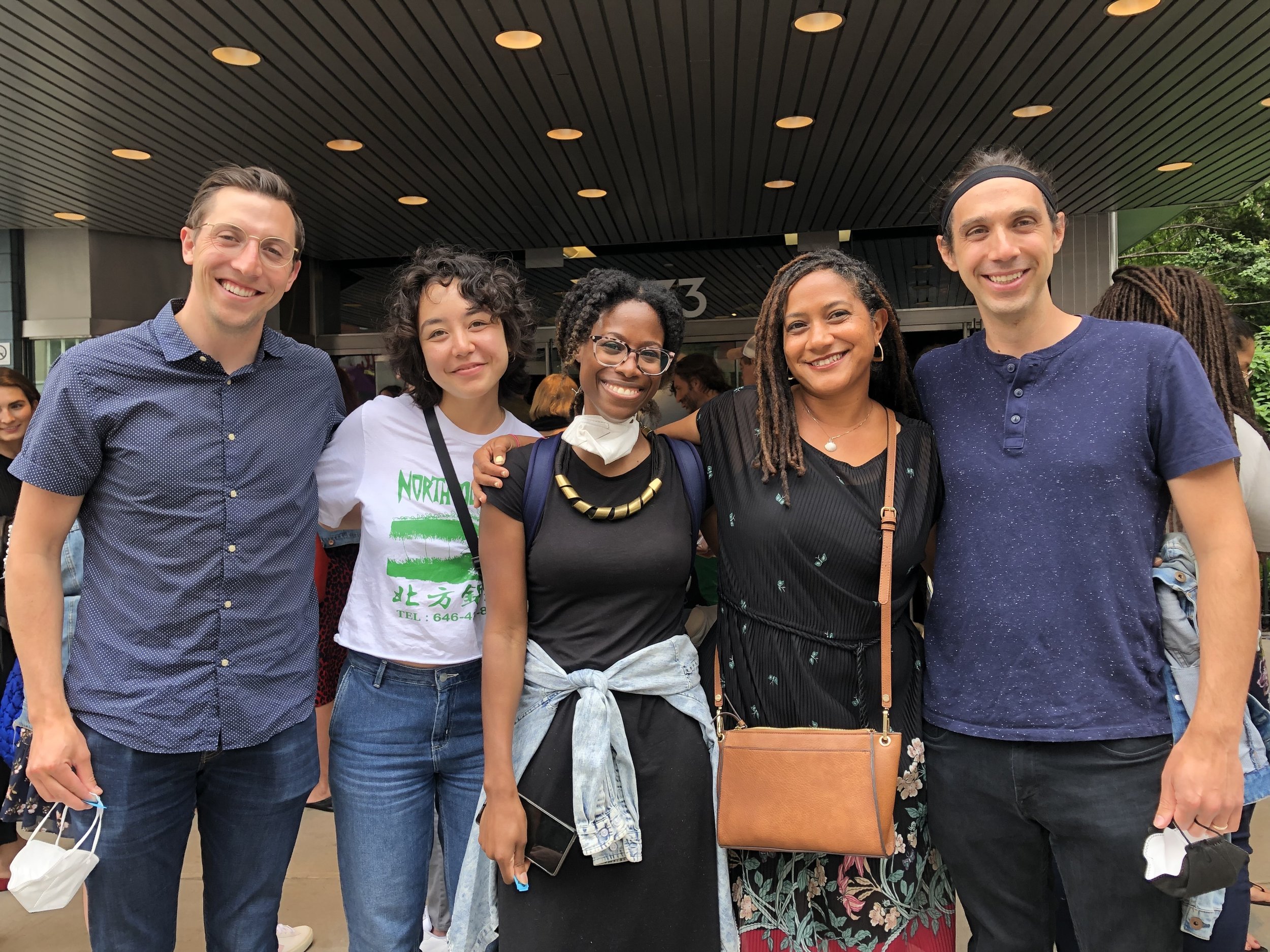 Five members of the Perspective Fund team smiling together
