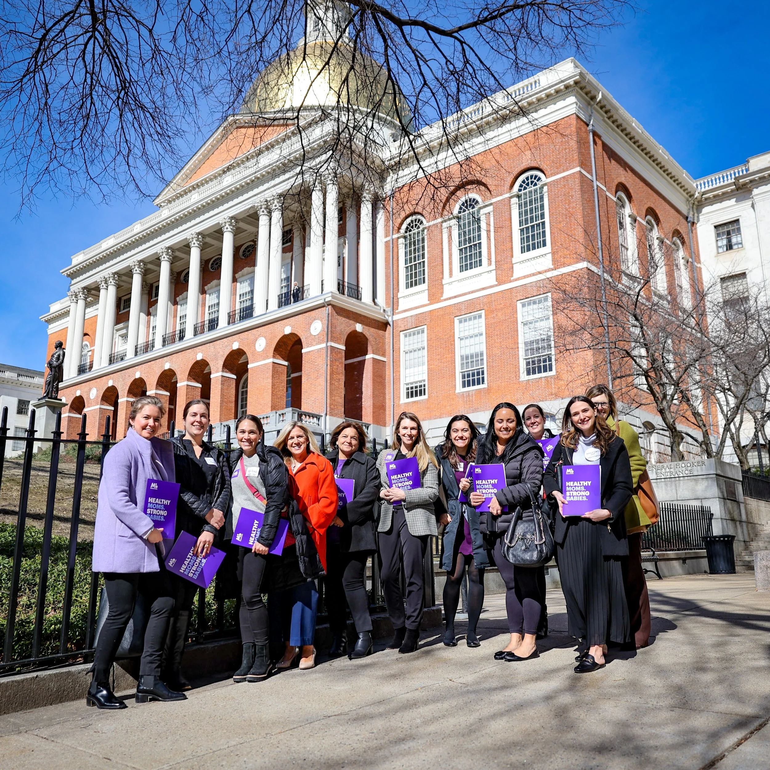 Advocates outside the State House at a previous event