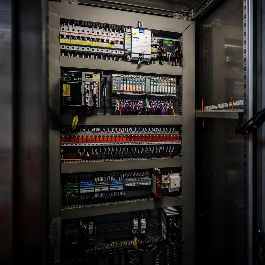 Fully wired industrial control cabinet with PLC and relay modules