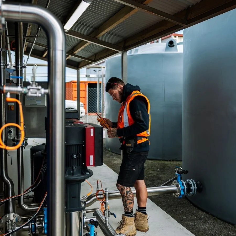 Electrician working on demineralised water plant controls