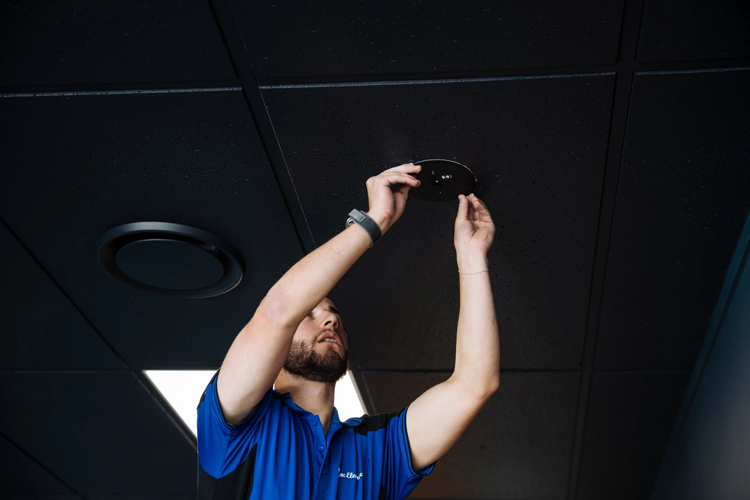 Linc Electrical electrician installing commercial lighting in Palmerston North