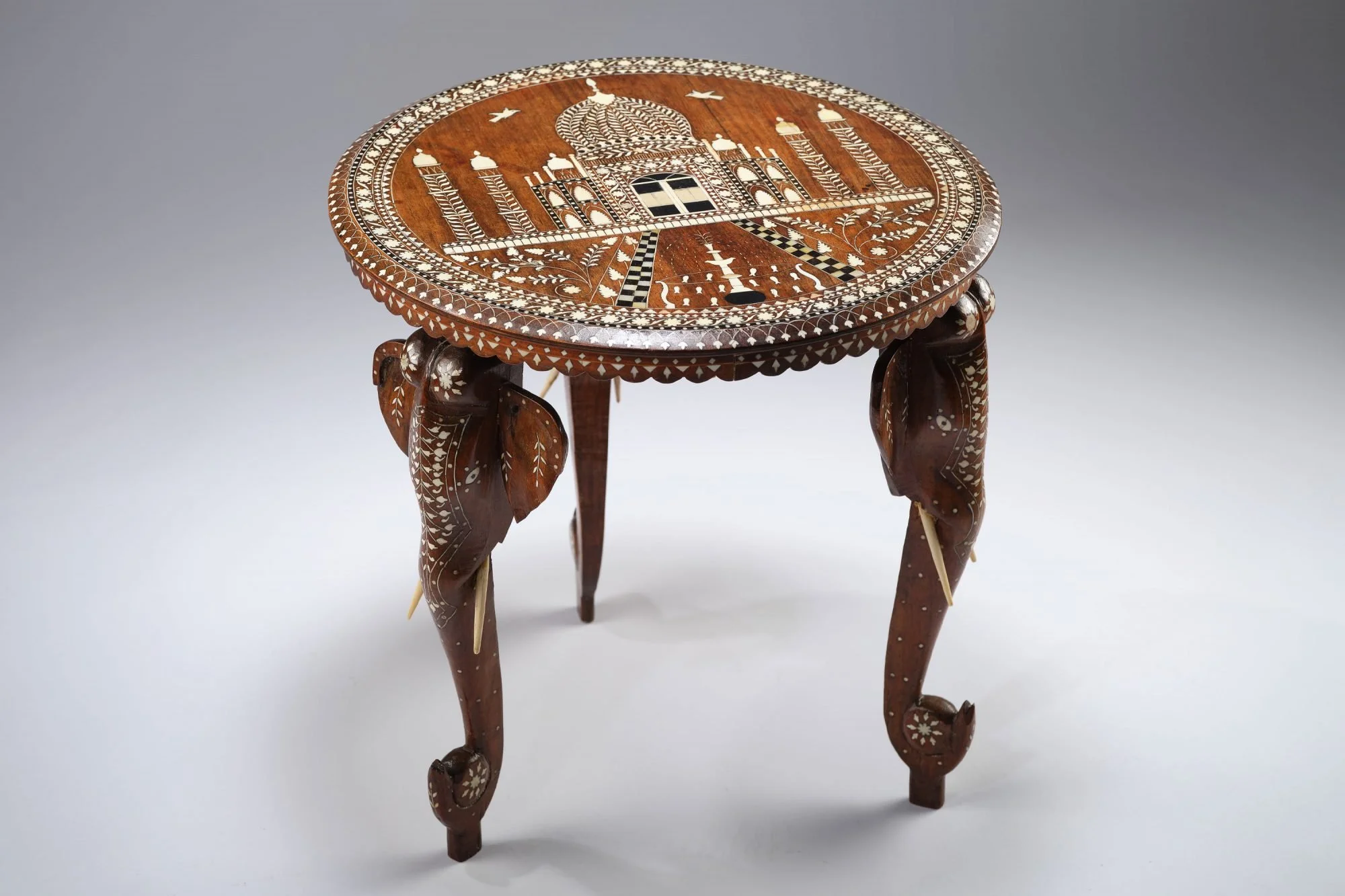 Antique Intricately carved Indian Teak Elephant side table depicting the‘Taj Mahal’