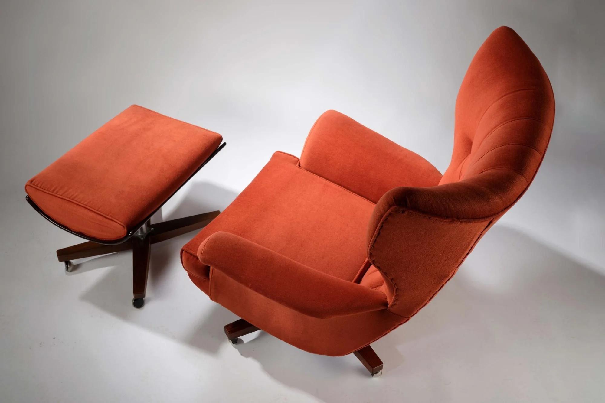 The Worlds Most Comfortable Chair The Iconic Mid Century ‘Blofeld’ G Plan 6250 Swivel & Rock Wing Chair With Footstool, England Circa 1960’s