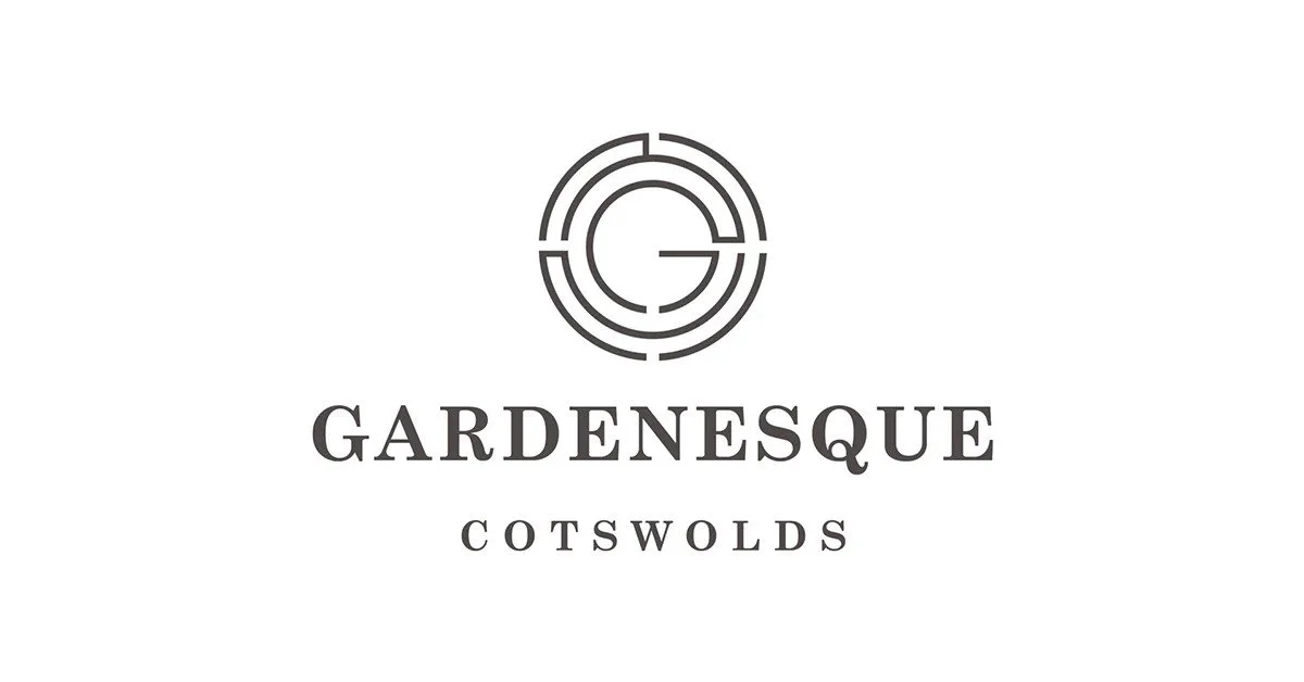 Logo with a circular geometric design above the text 'GARDENESQUE' in bold uppercase letters, and 'COTSWOLDS' in smaller uppercase letters below.