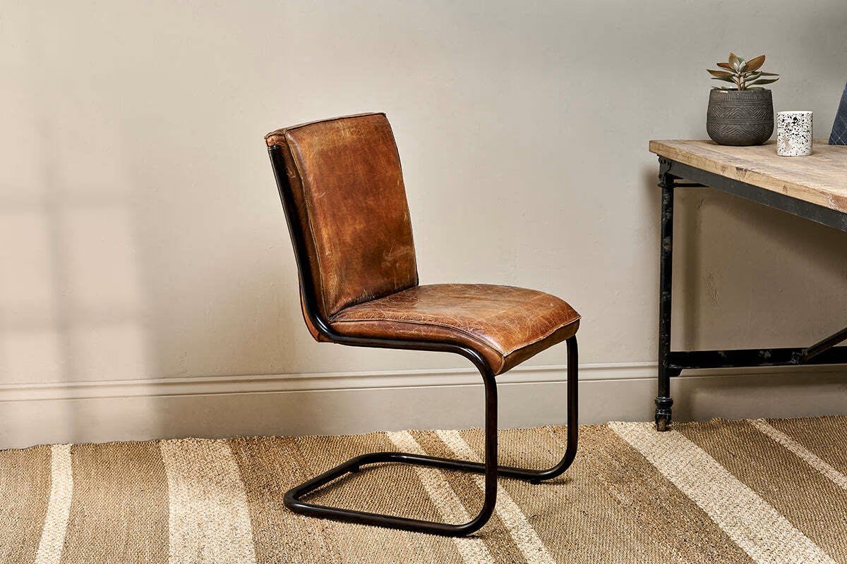 AGED TAN LEATHER DESK CHAIR