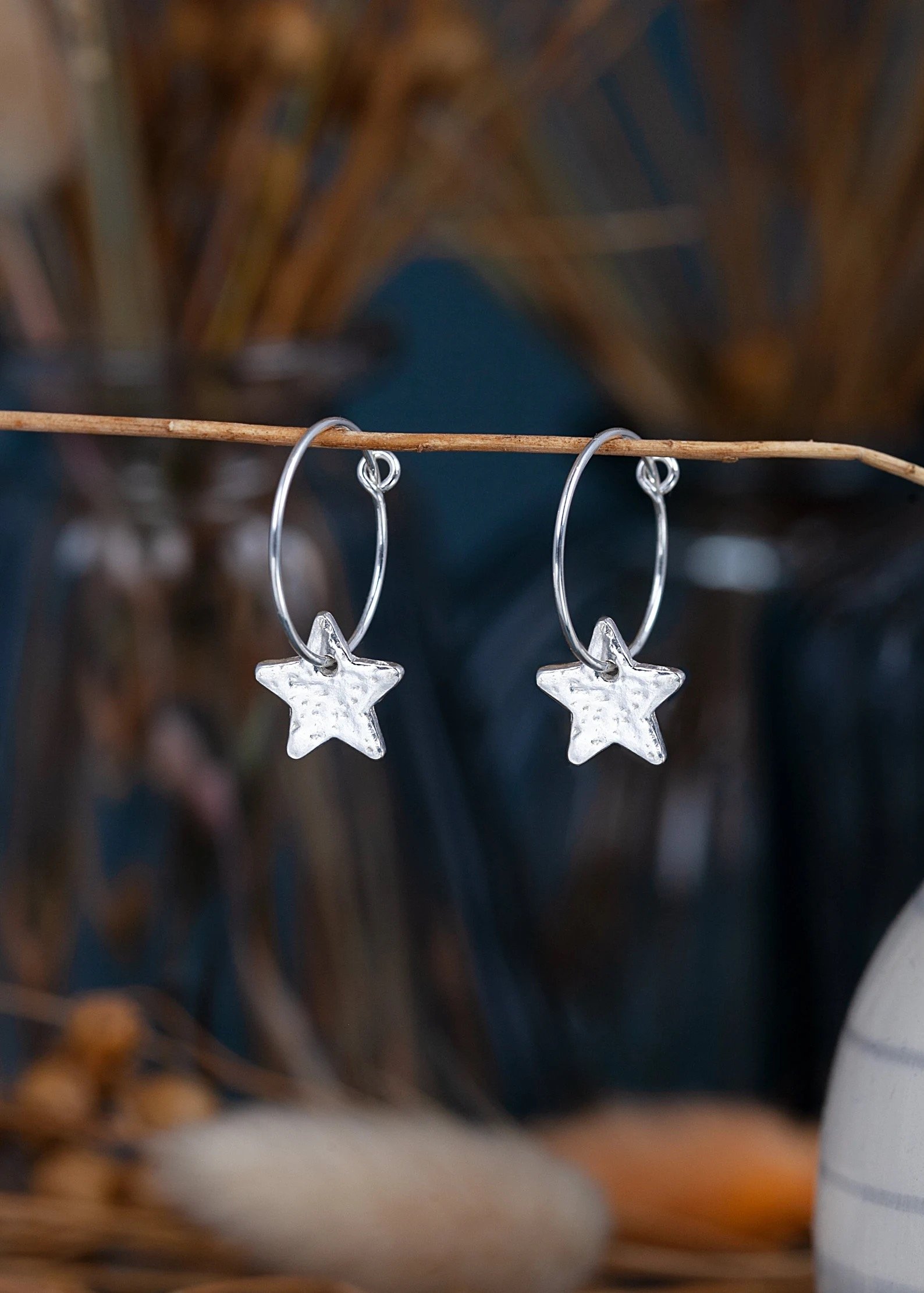 1/20 CT. T.W. Diamond Star Huggie Hoop Earrings in Sterling Silver | Banter