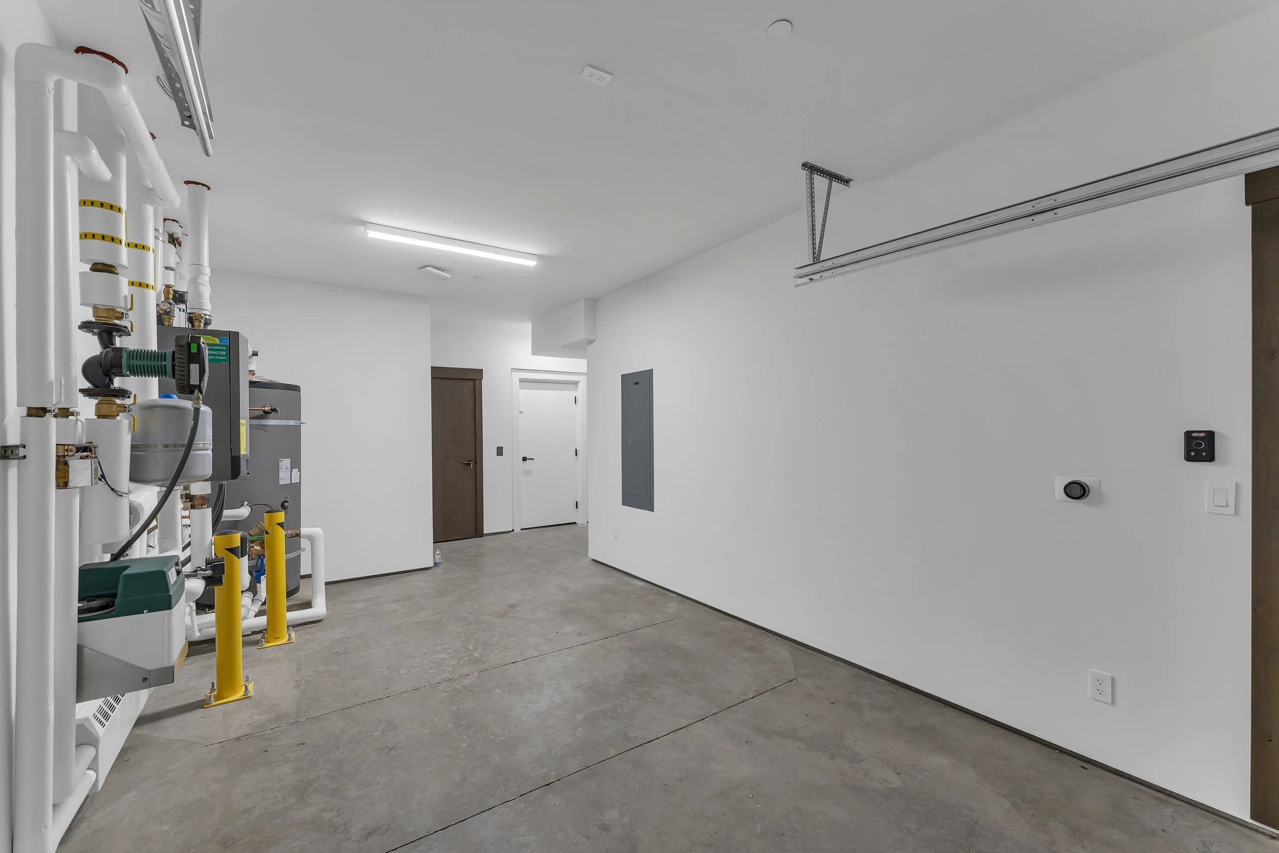 Spacious private garage with two storage closets