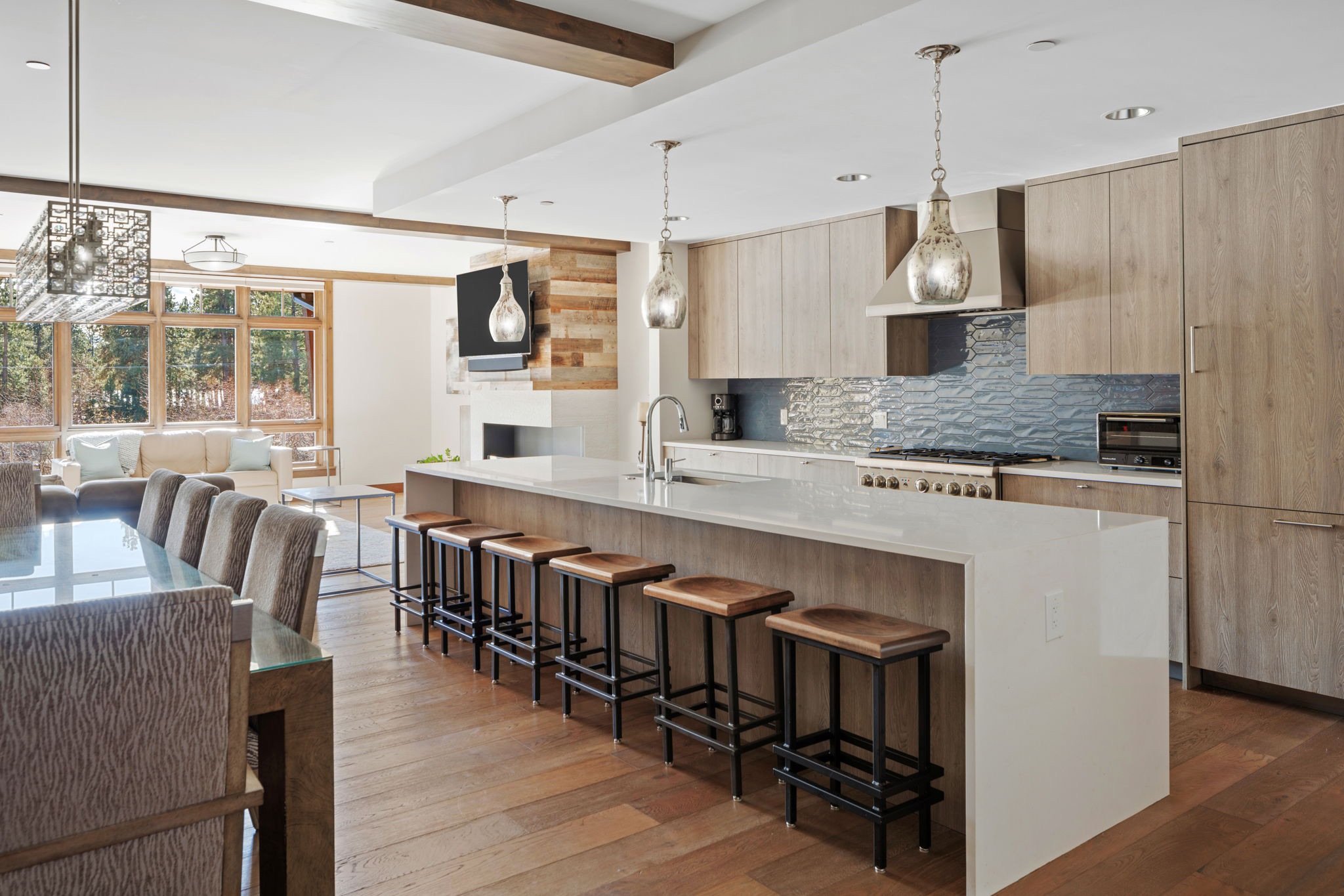 Tahoe Beach Club vacation residence’s spacious kitchen with a sizable island and warm wooden floors, creating a cozy and inviting atmosphere.