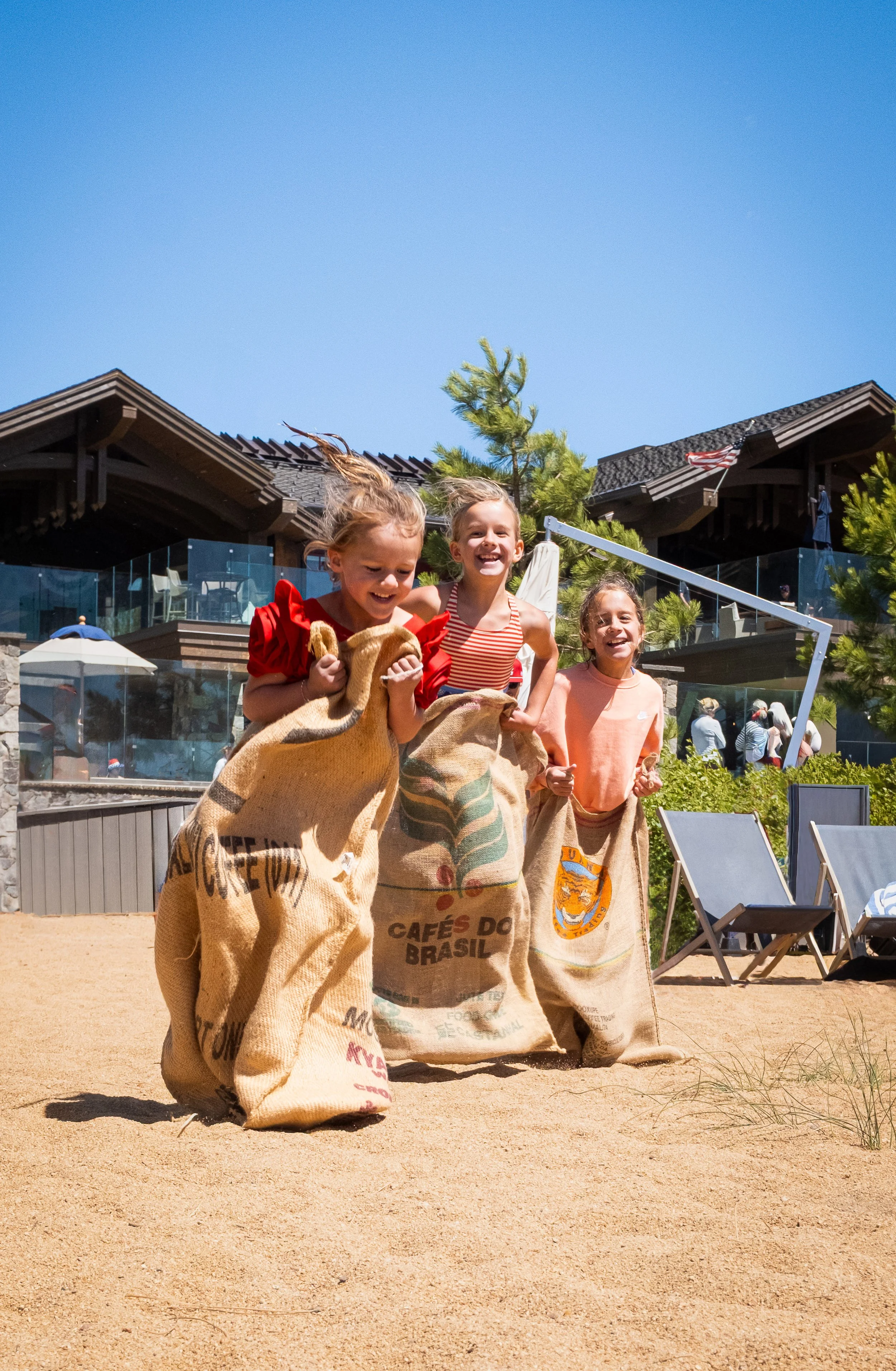 TBC_Photo_4th of July kids sack race summer celebration_20250704_0916_retouched-2.jpg