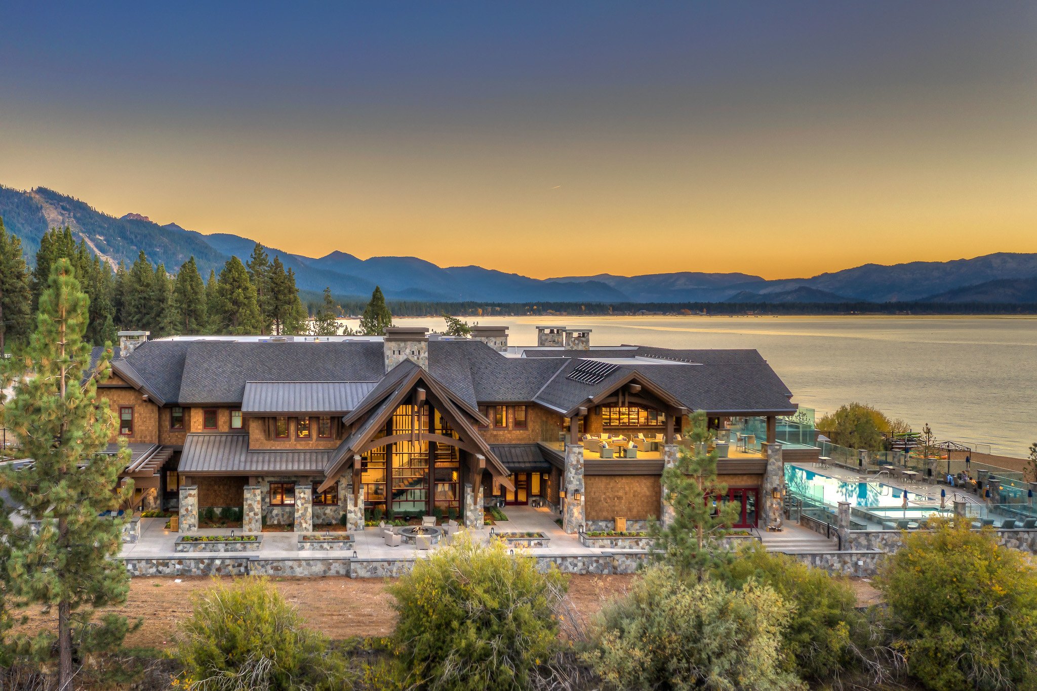 Exterior of Tahoe Beach Club’s Clubhouse, with Lake Tahoe in the background.