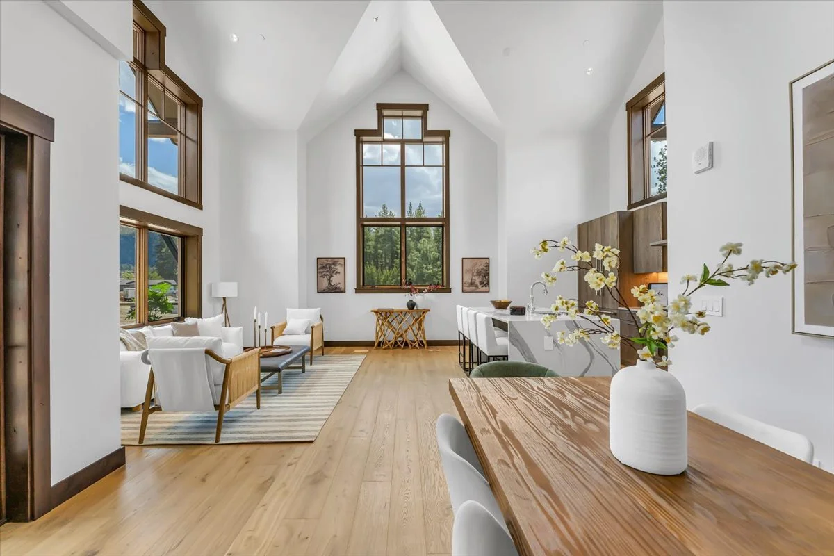 Thoughtfully designed open-concept floor plan at Tahoe Beach Club, seamlessly blending the kitchen, living, and dining areas. Stunning architecture is complemented by expansive windows that frame breathtaking scenic views.