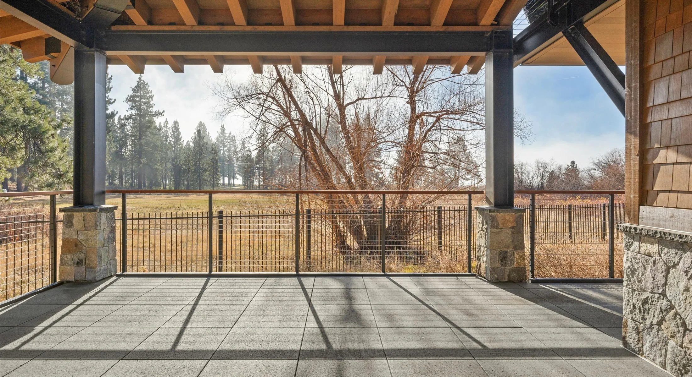 Residence 111 offers private and covered patios providing panoramic views of Lake Tahoe pine trees. 