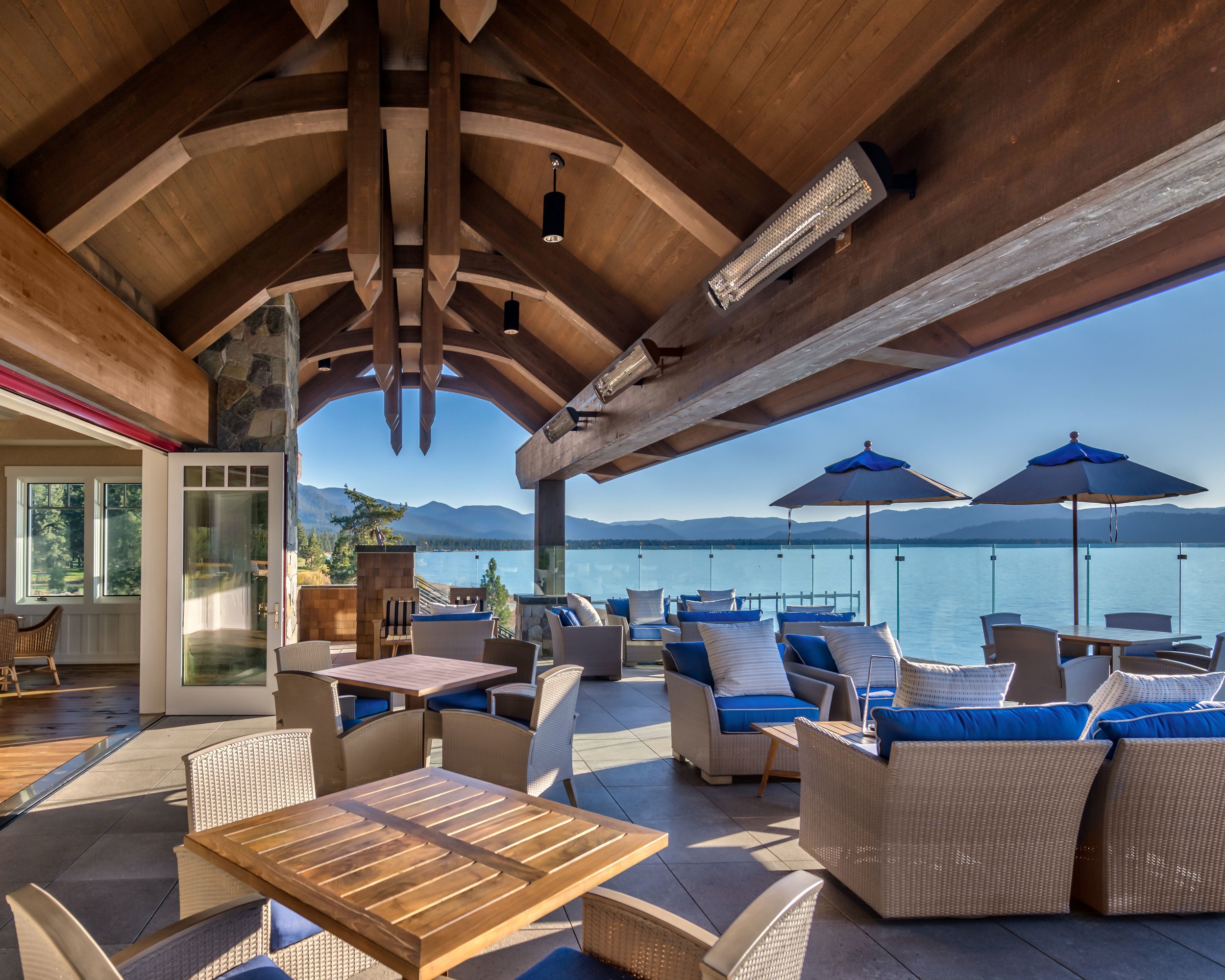 Tahoe Beach Club's serene lakefront patio with breathtaking view of the tranquil waters and surrounding nature.